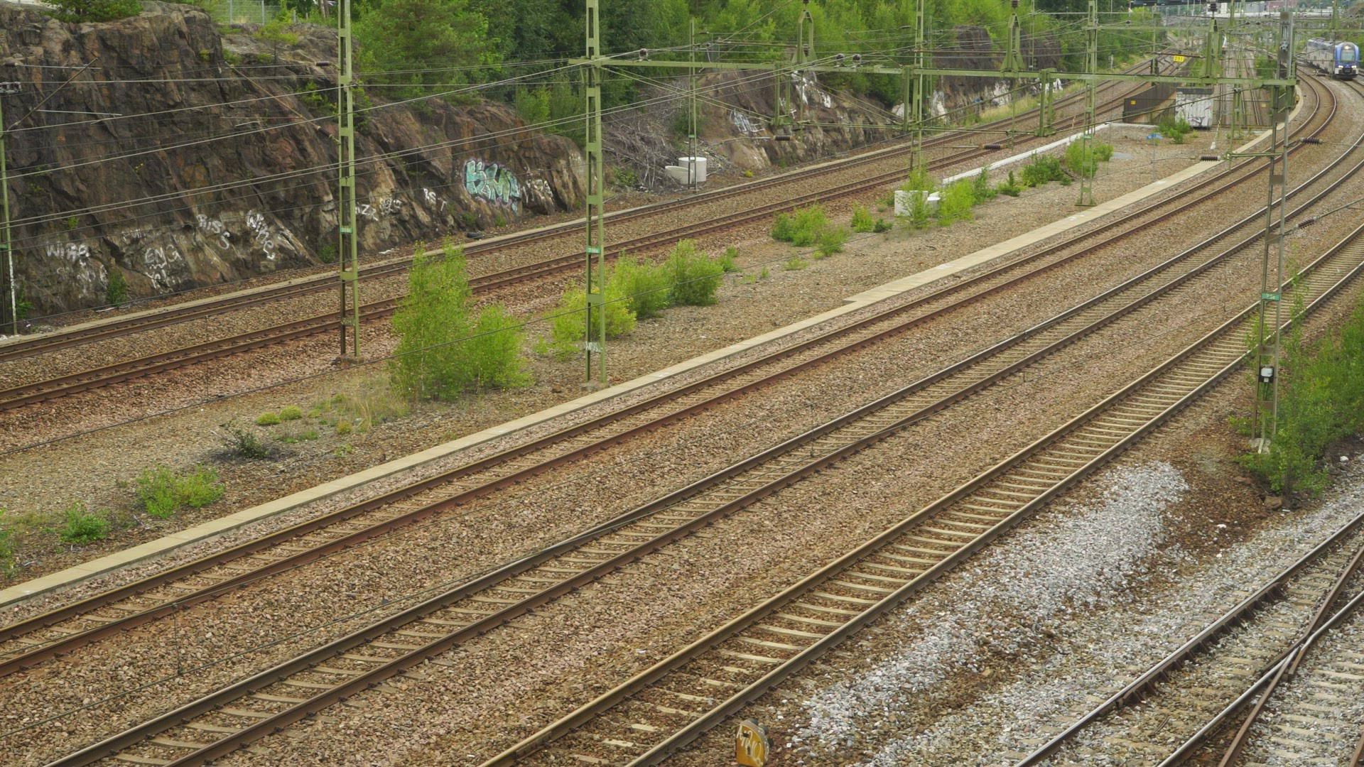 train passing on railway tracks near stockholm