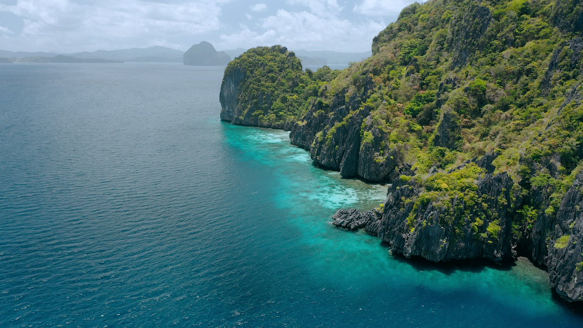 Aerial view of cliff coastline of Entalula Island, El-Nido. Palawan, Philippines