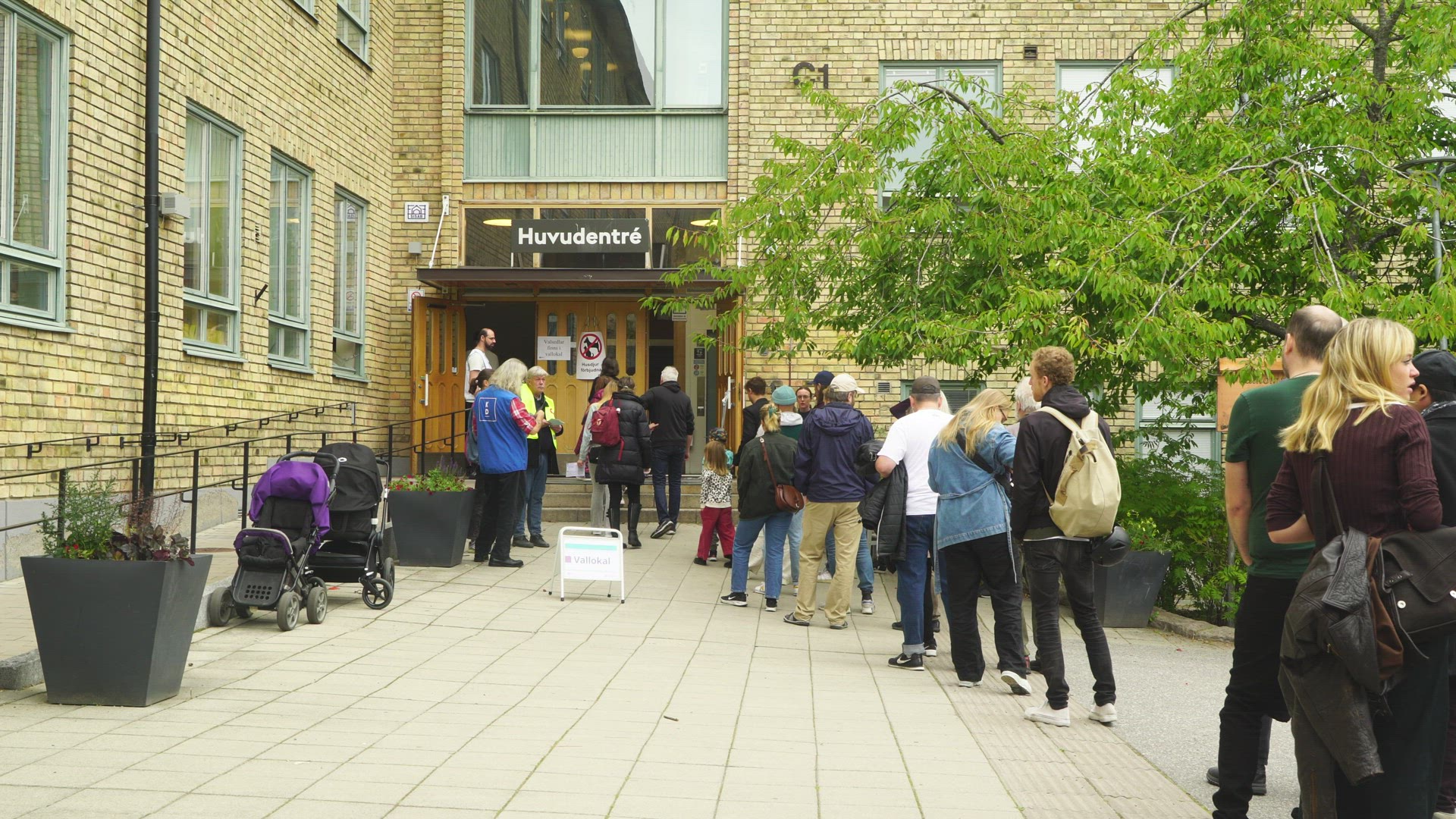 election day in sweden - people in queue outside school