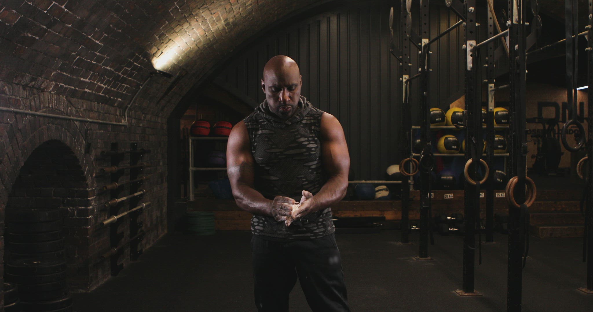 Man using chalk at gym