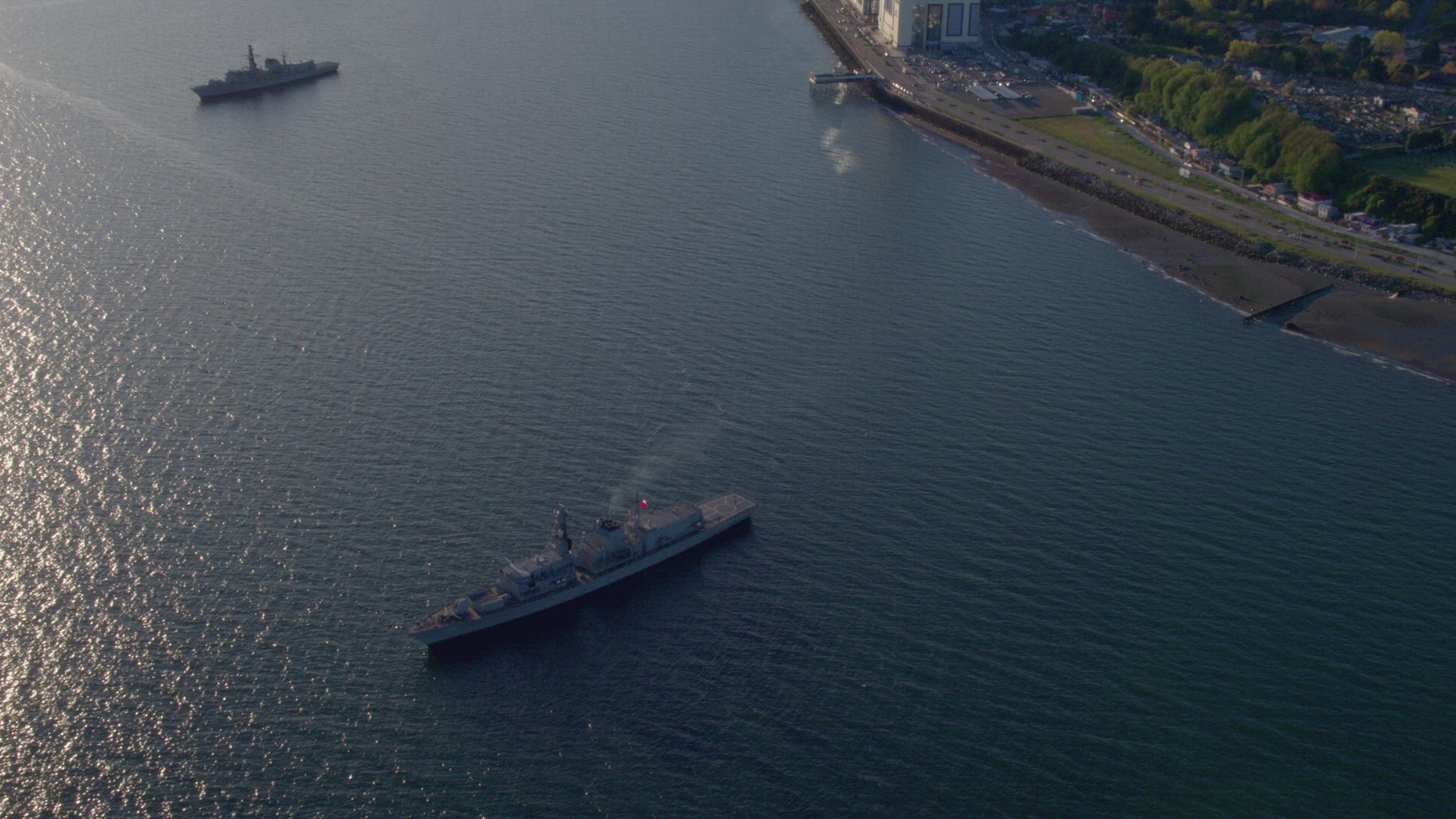 Aerial View Of Two Chilean Navy Frigates Off Coast Of Puerto Montt Bay