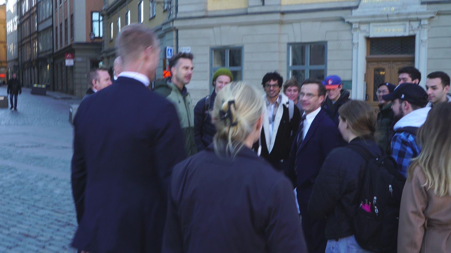 Sweden Prime Minister Ulf Kristersson with bodyguards outside party headquarter 