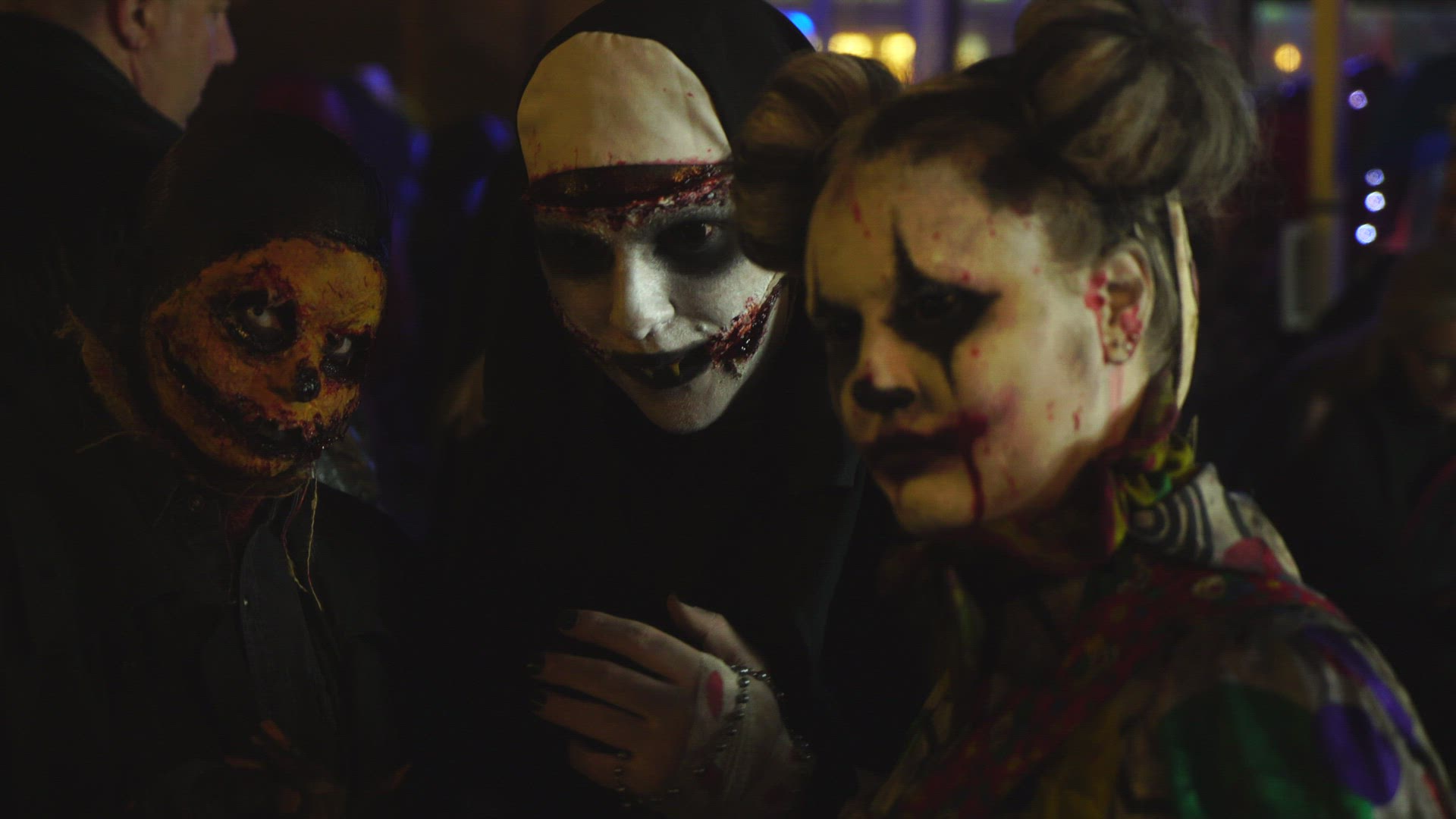 halloween parade in Stockholm - three women in halloween outfits