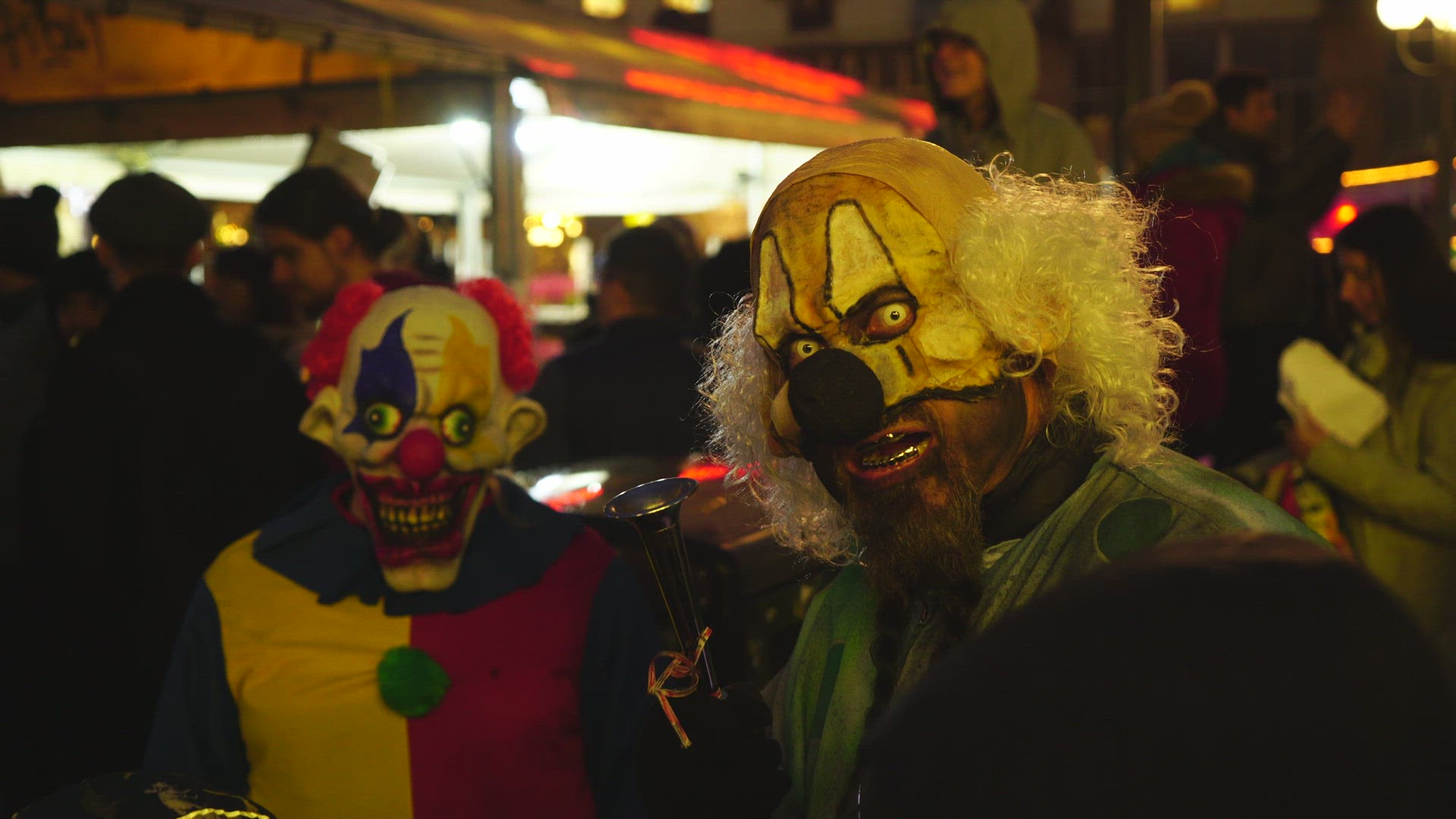 halloween parade in Stockholm - two persons in clown outfits