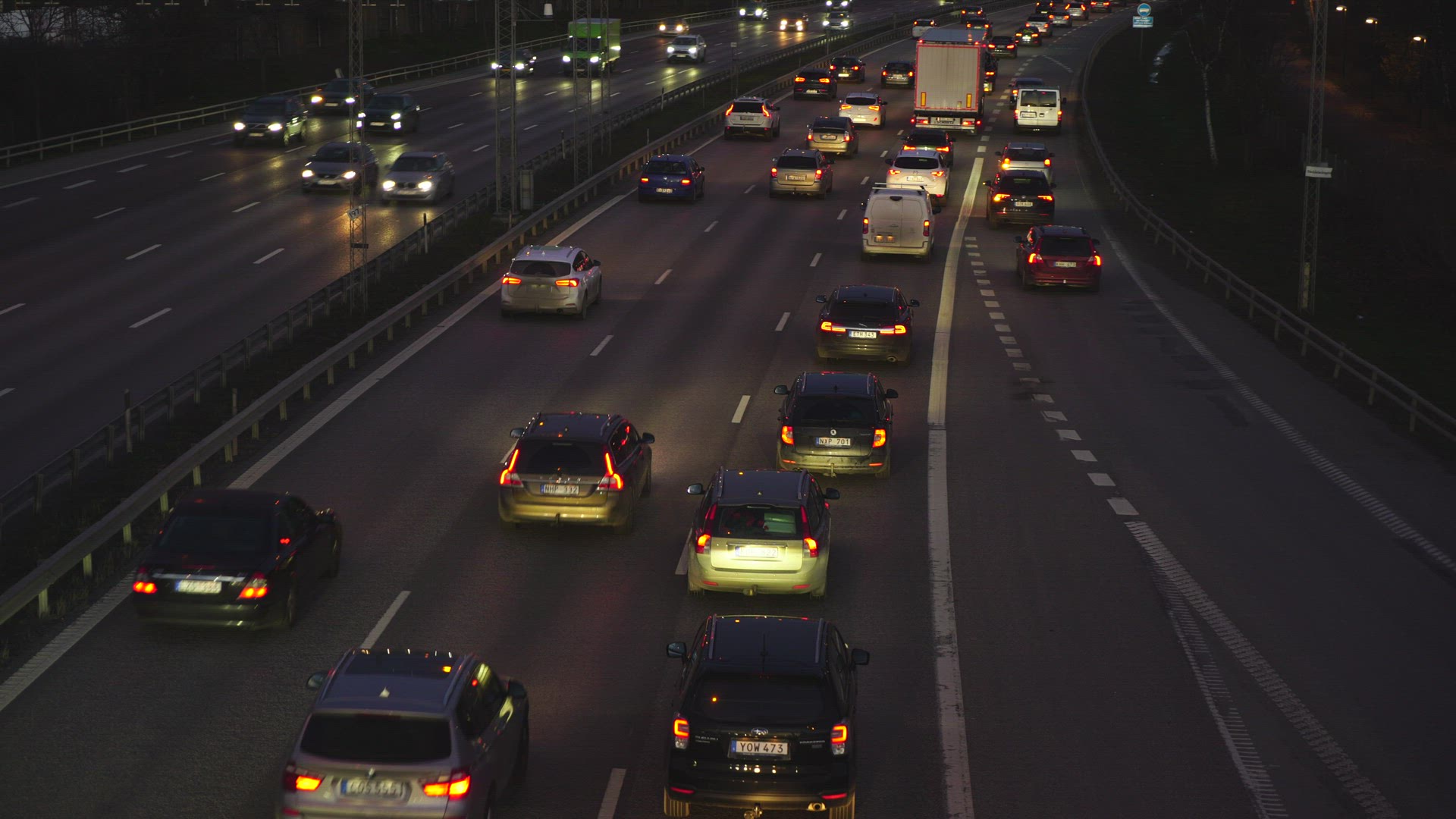 evening shot of traffic on highway near Stockholm city - dusk