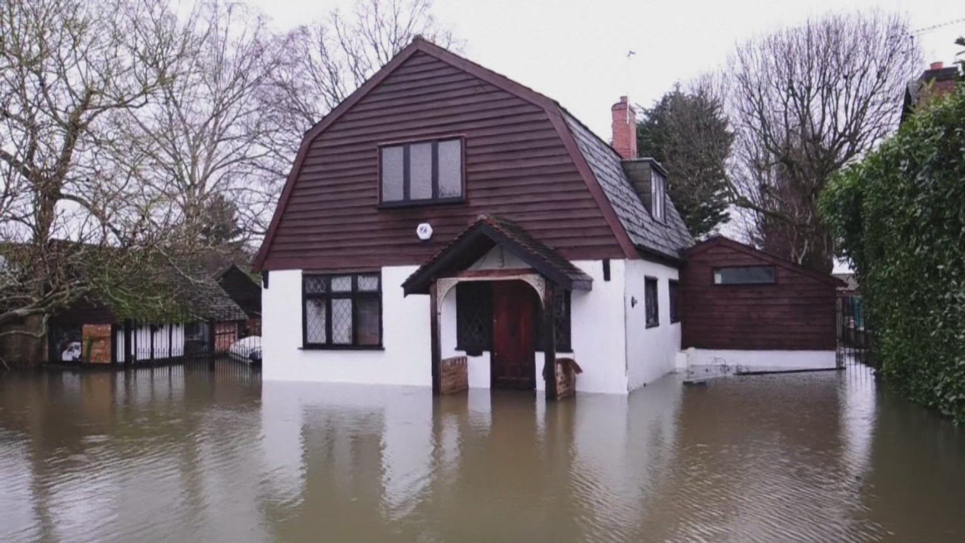 Hundreds of homes on Thames swamped as UK floods spread