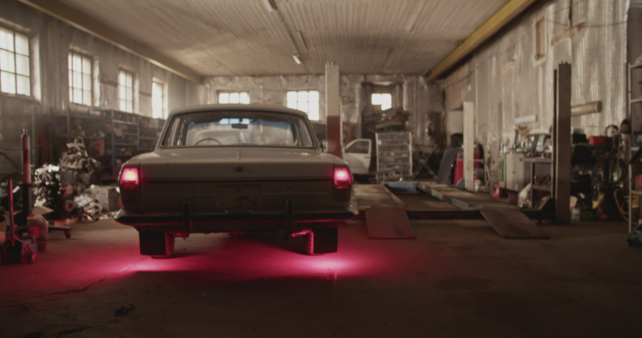 Garage with vintage car in daytime