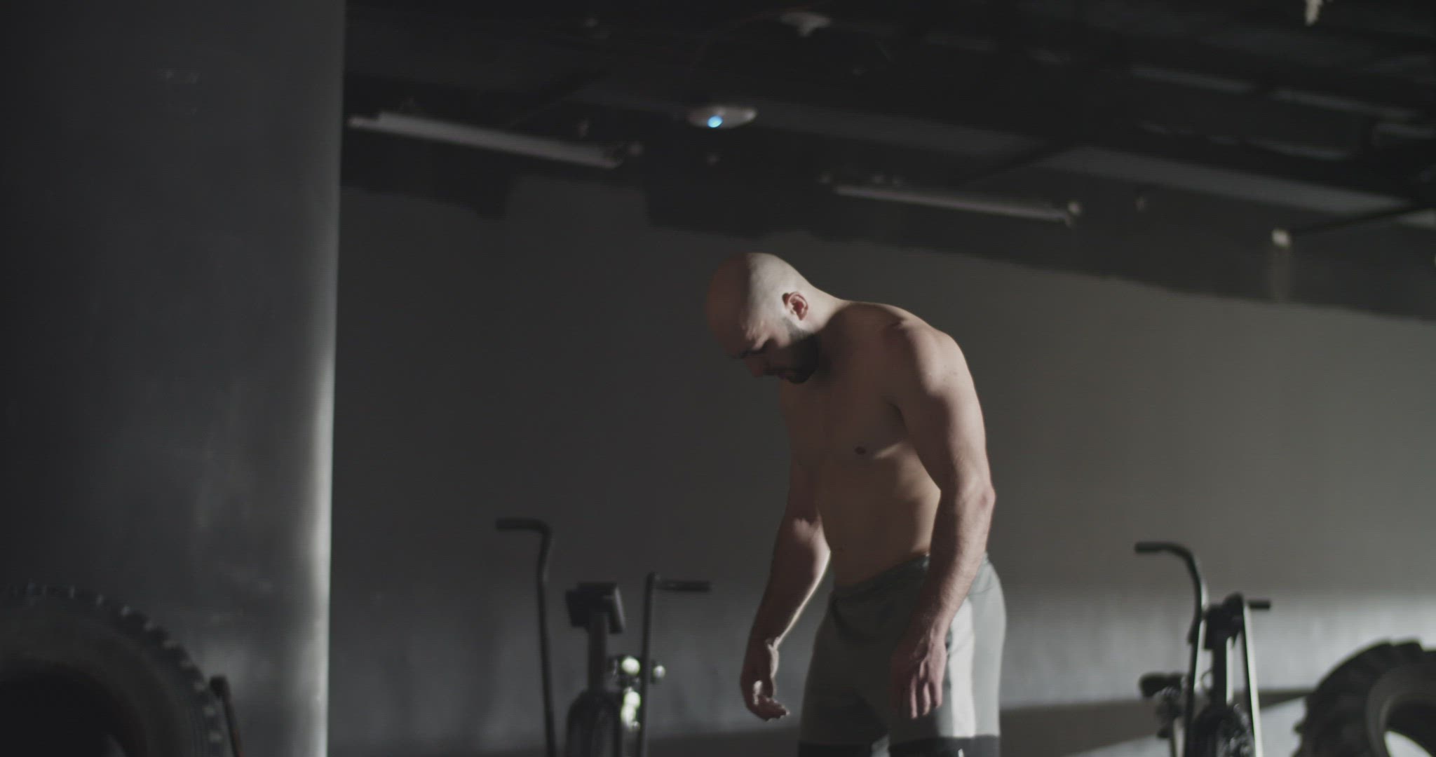 Sportswoman doing unsuccessful attempt during deadlift exercise