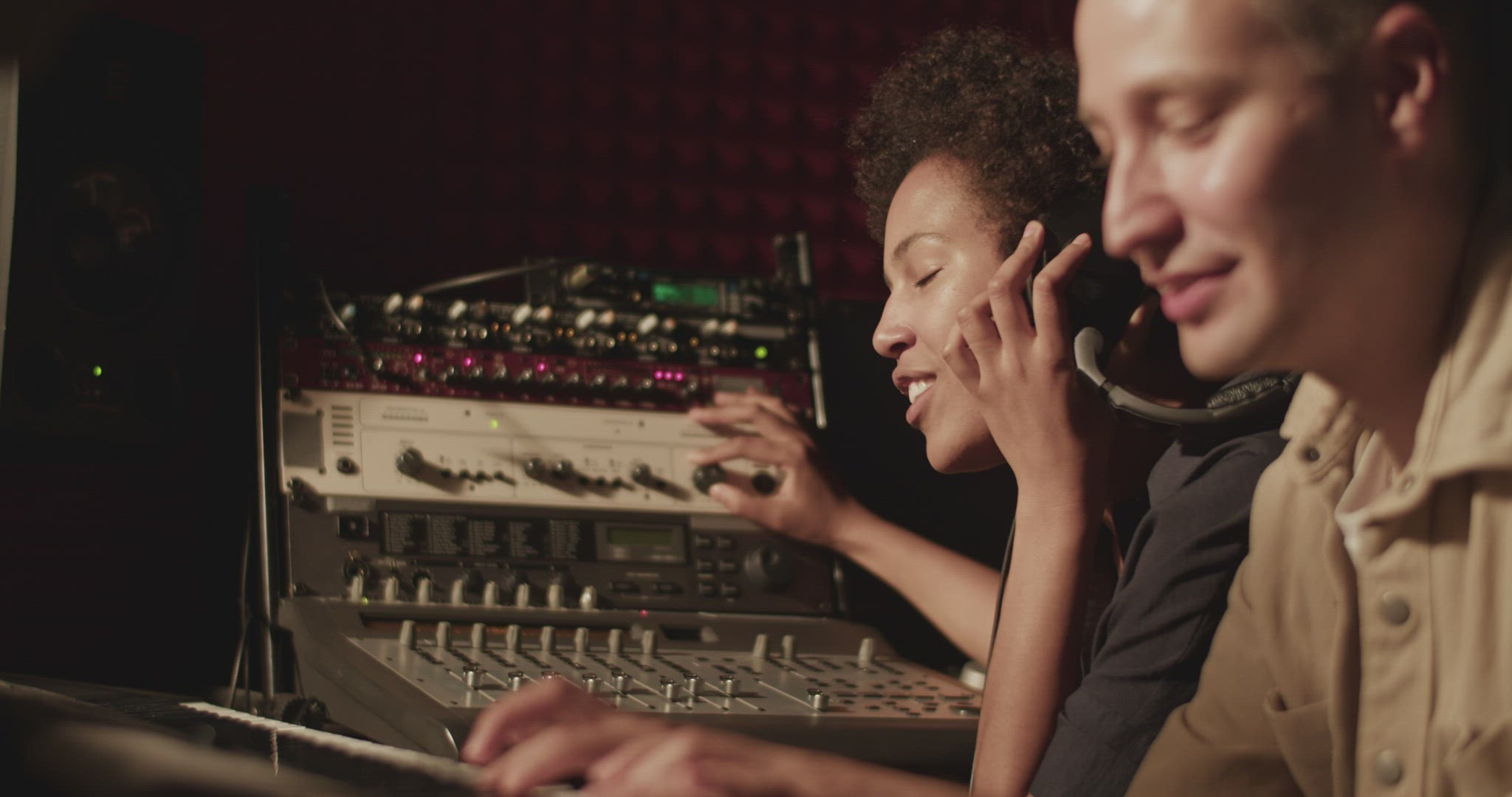 Singer and pianist working in studio