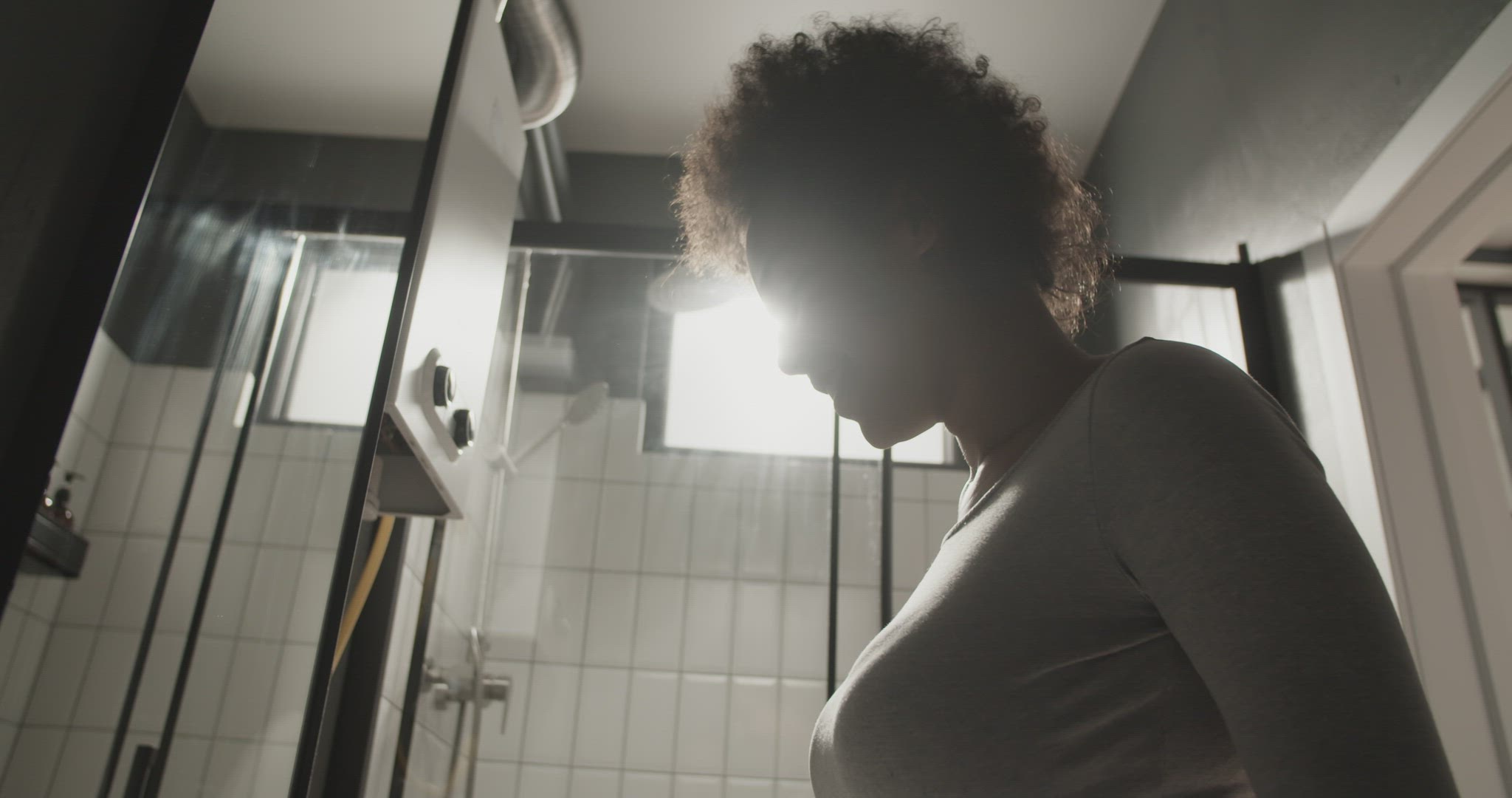 Black female checking and gargling throat