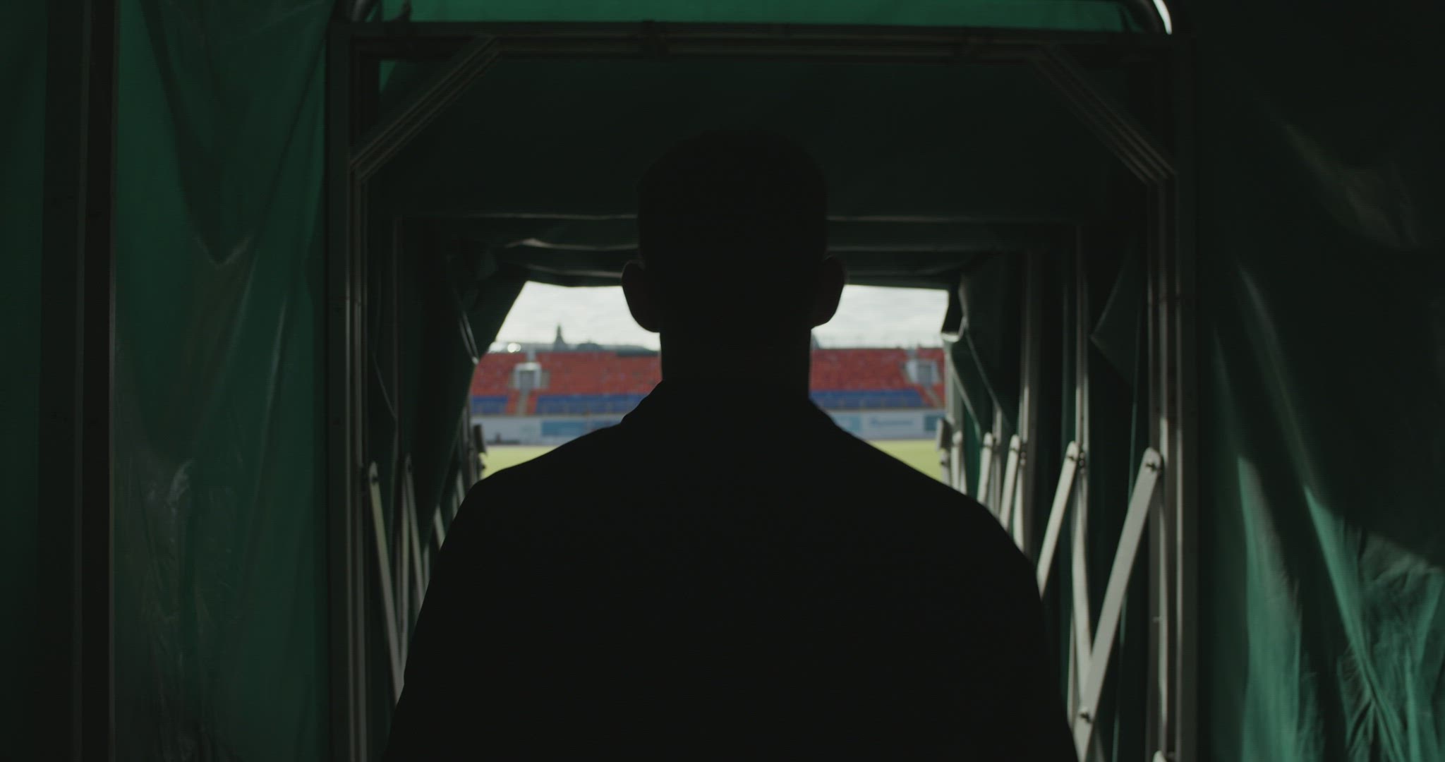Sportsman entering arena before workout