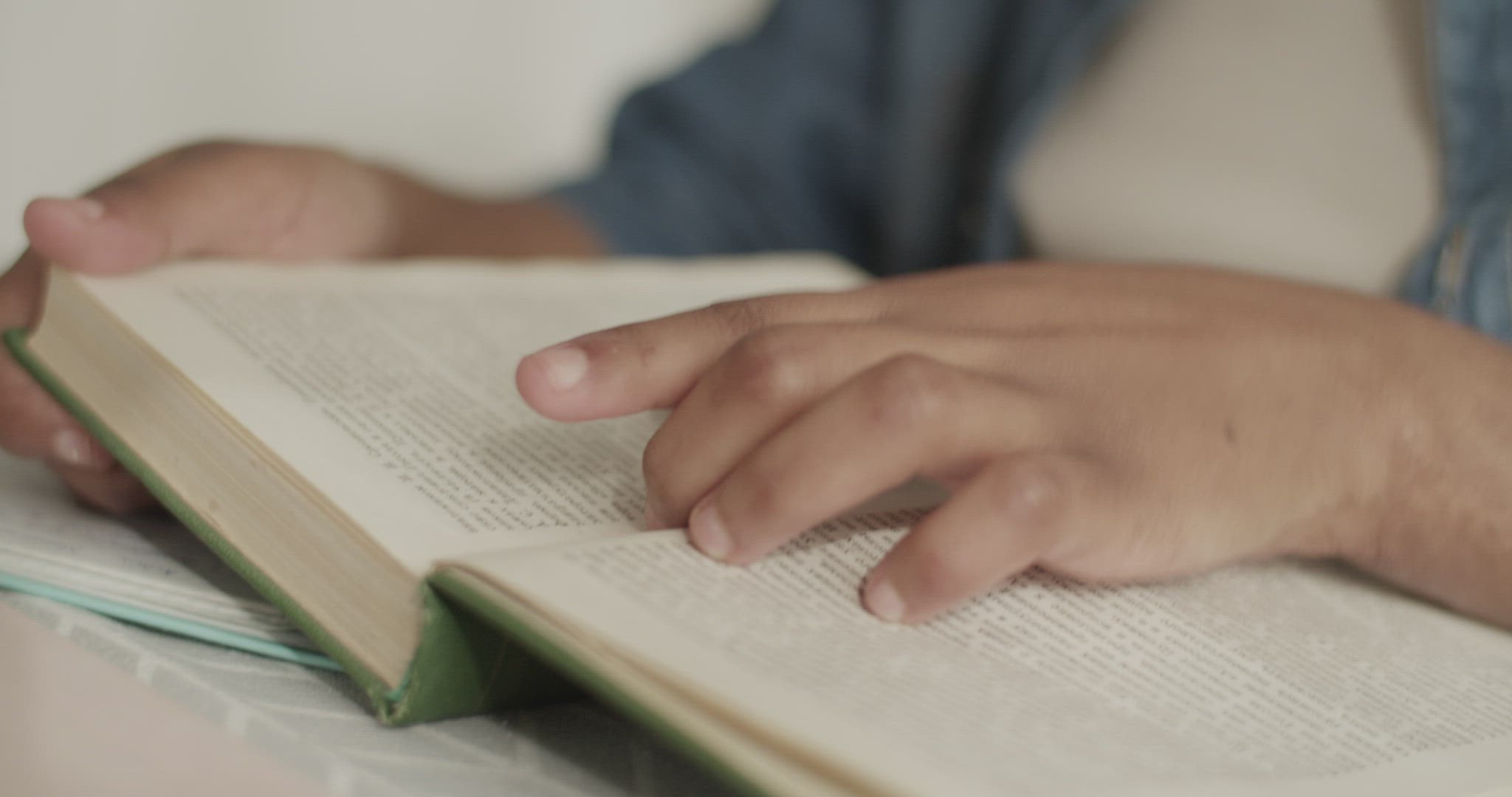 African American student reading book