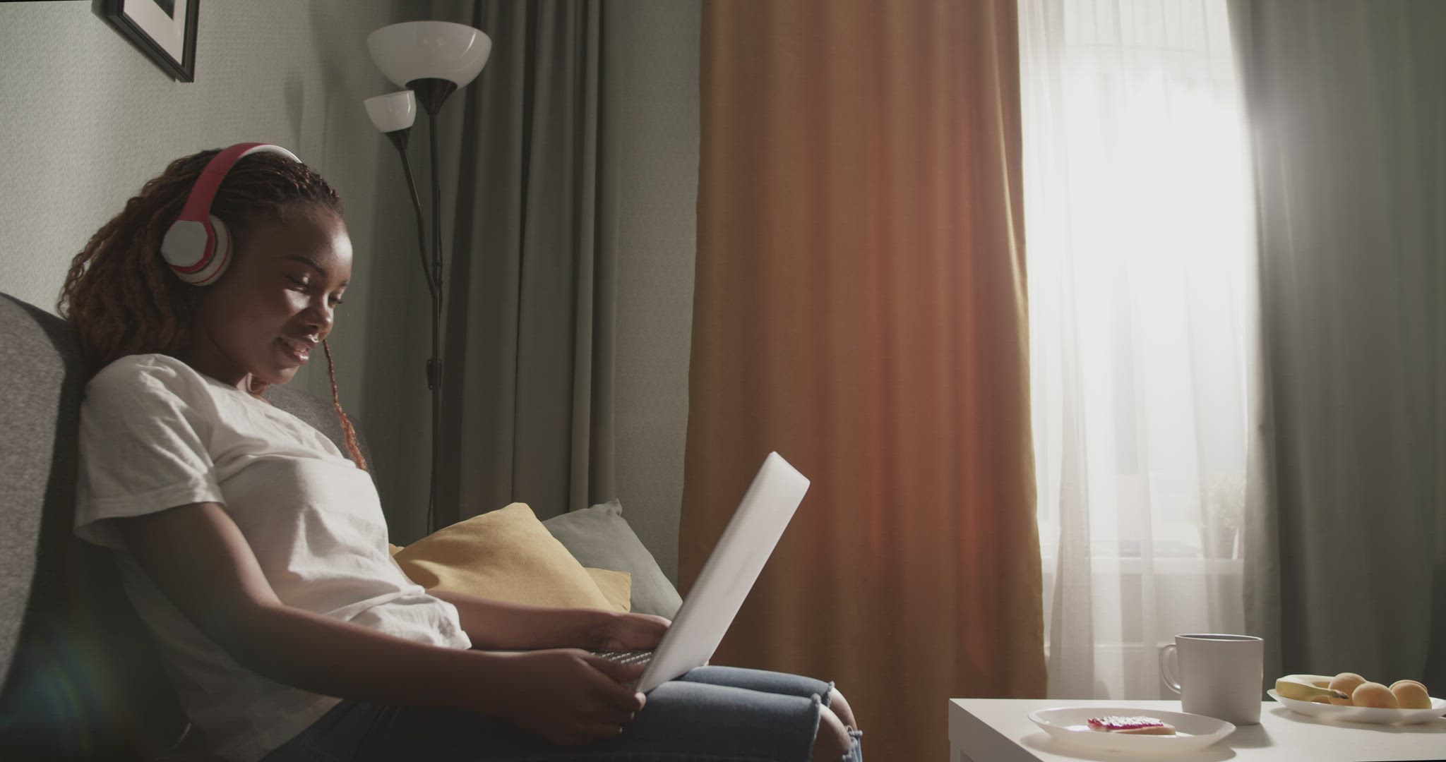 Black female watching interesting movie