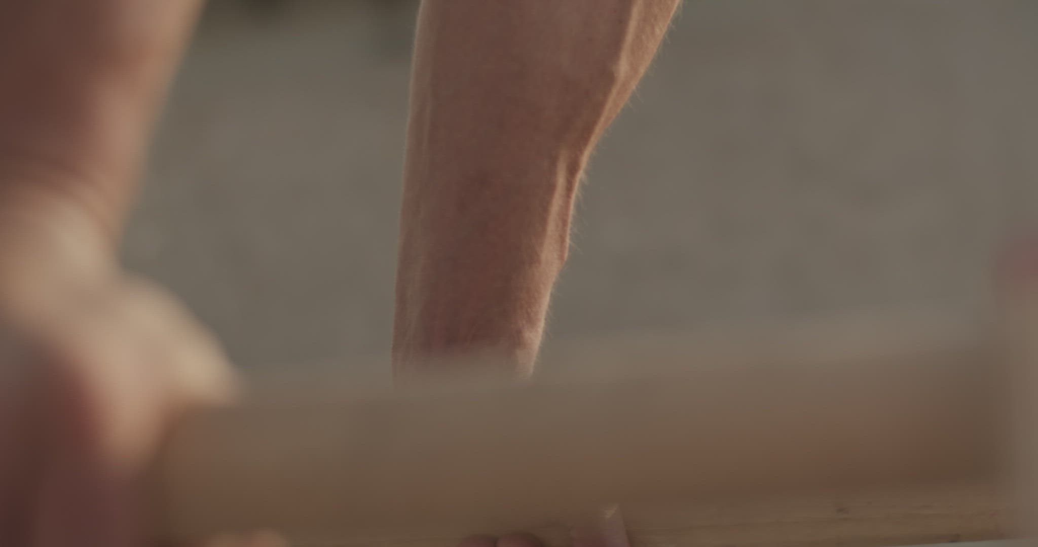 Sportsman doing plank on bars