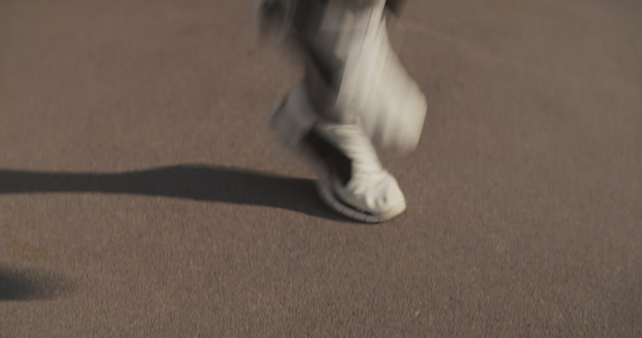 Muscular sportsman running fast on spot