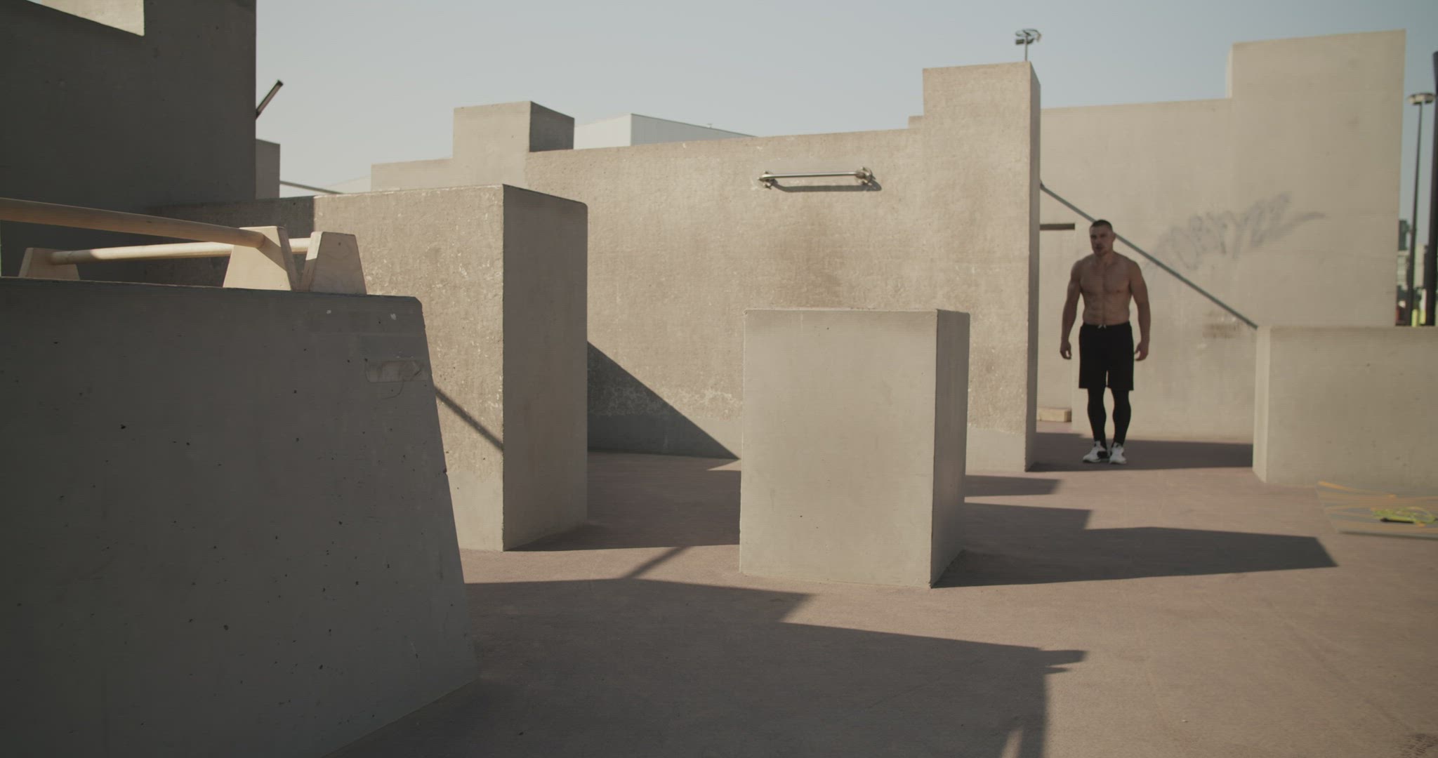 Sportsman practicing parkour on street