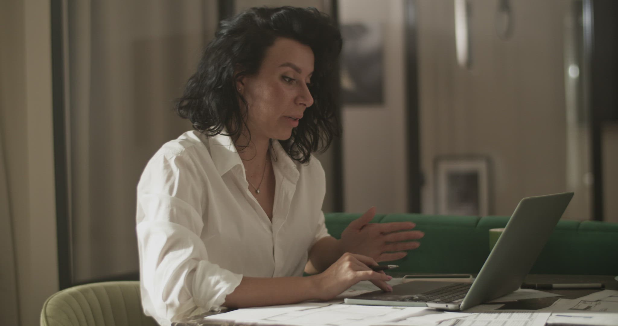 Businesswoman making video call at home