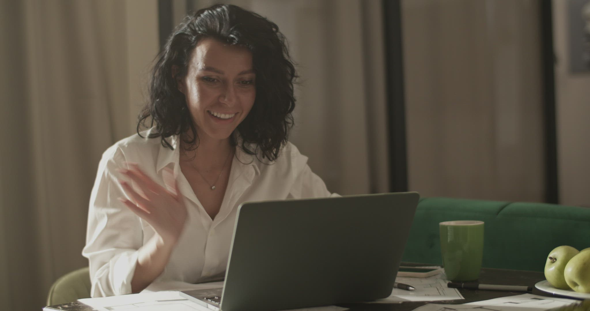 Friendly businesswoman starting video call