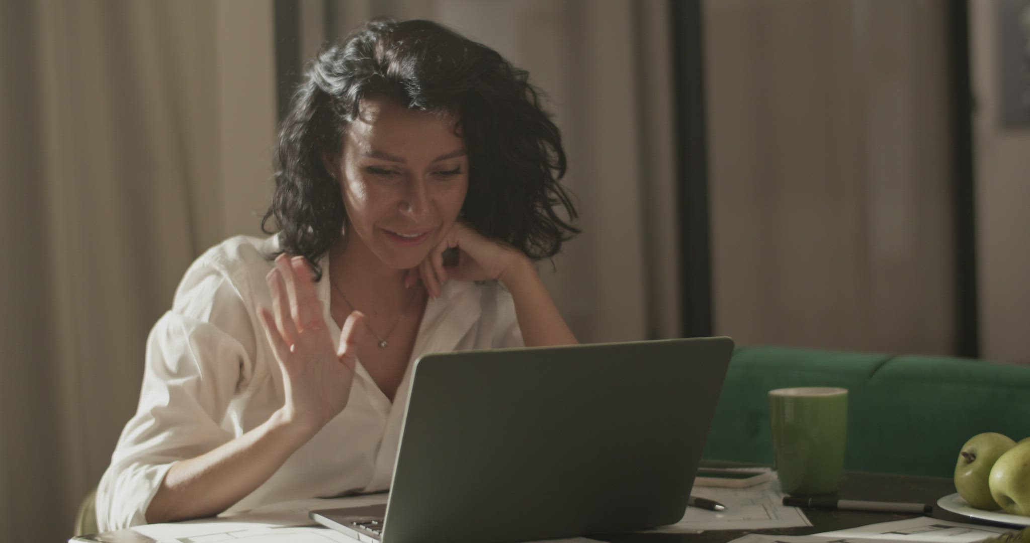 Friendly businesswoman starting video call
