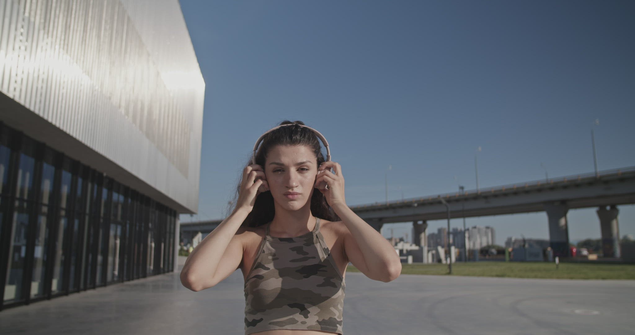 Female dancer taking off headphones