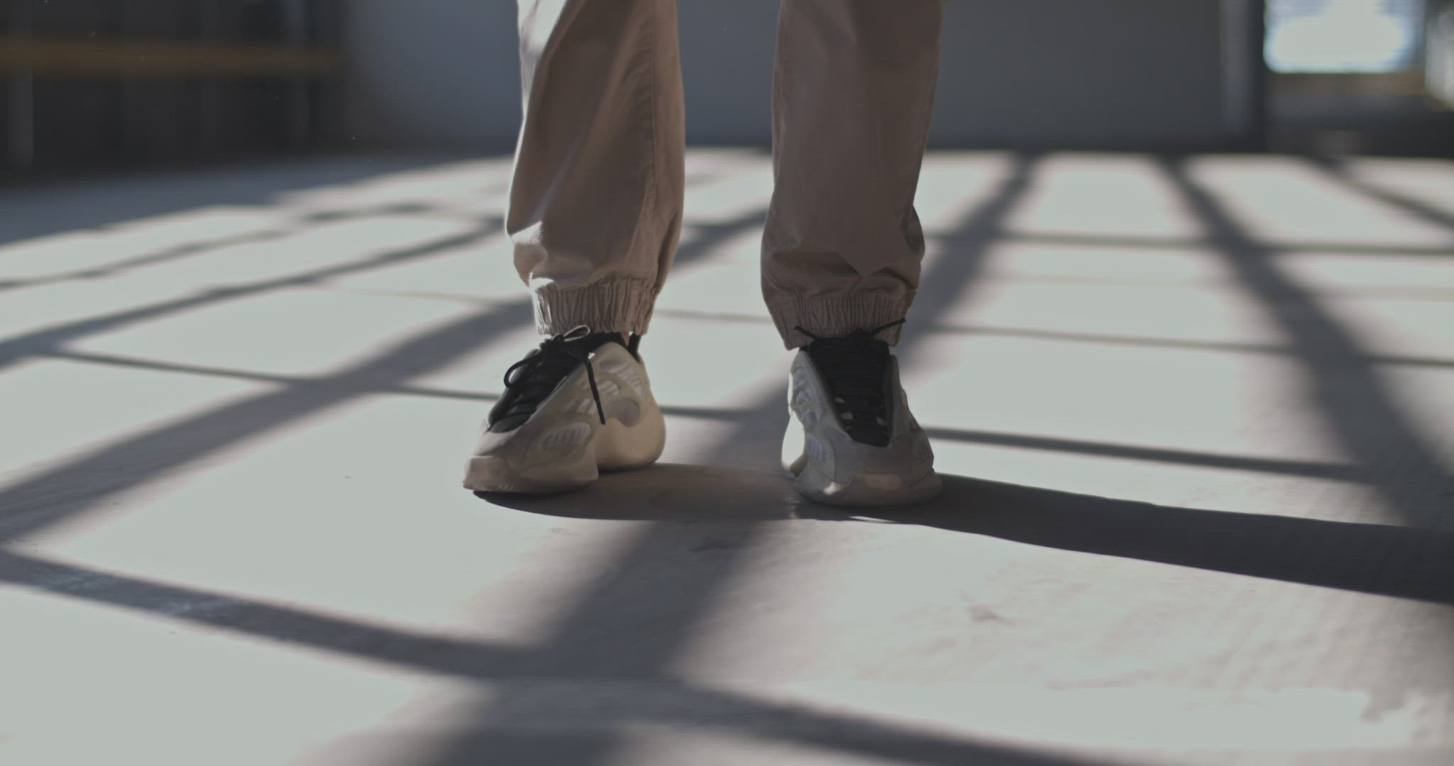 Young woman dancing on dusty floor