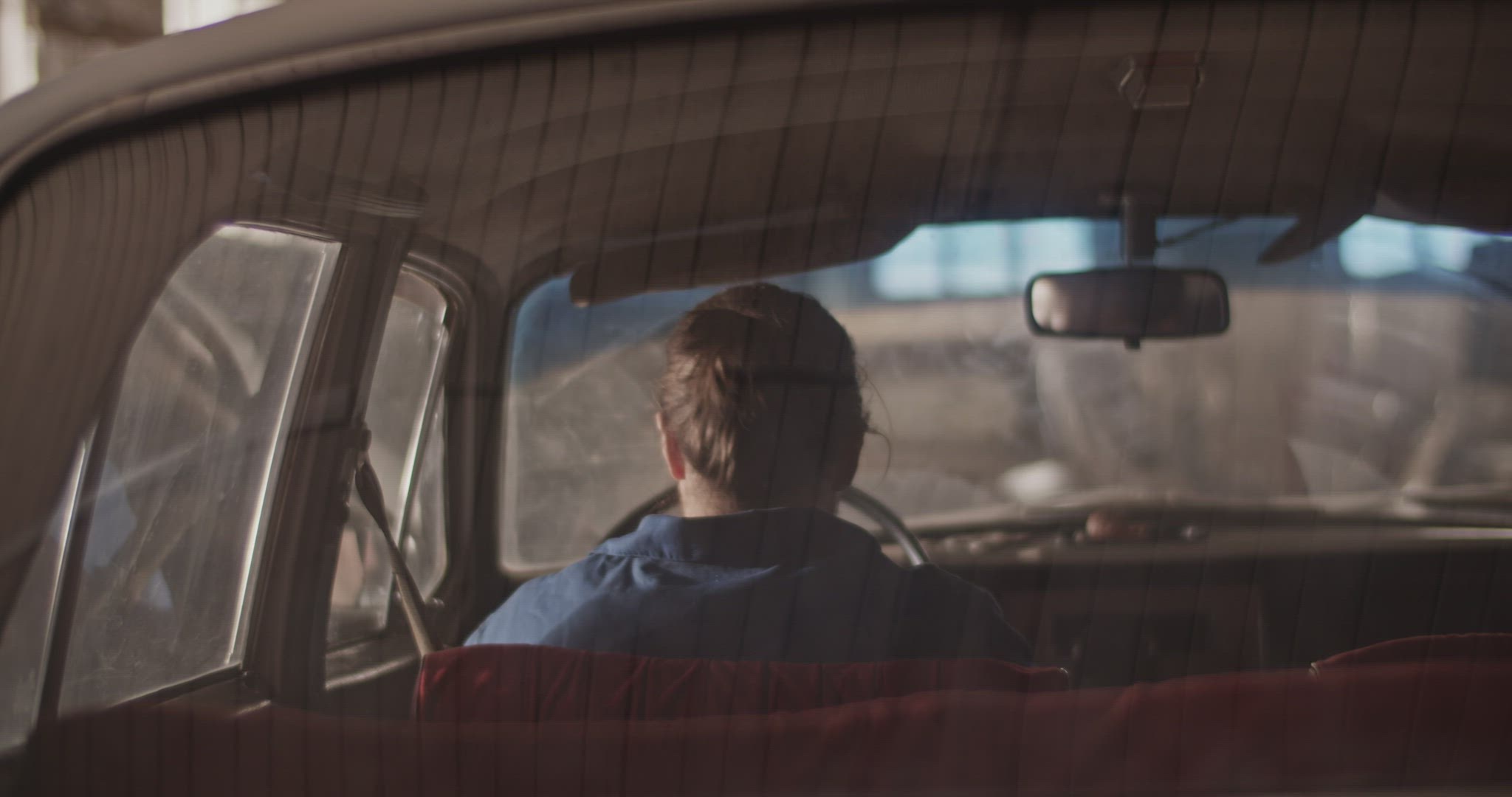 Anonymous technician testing vintage car