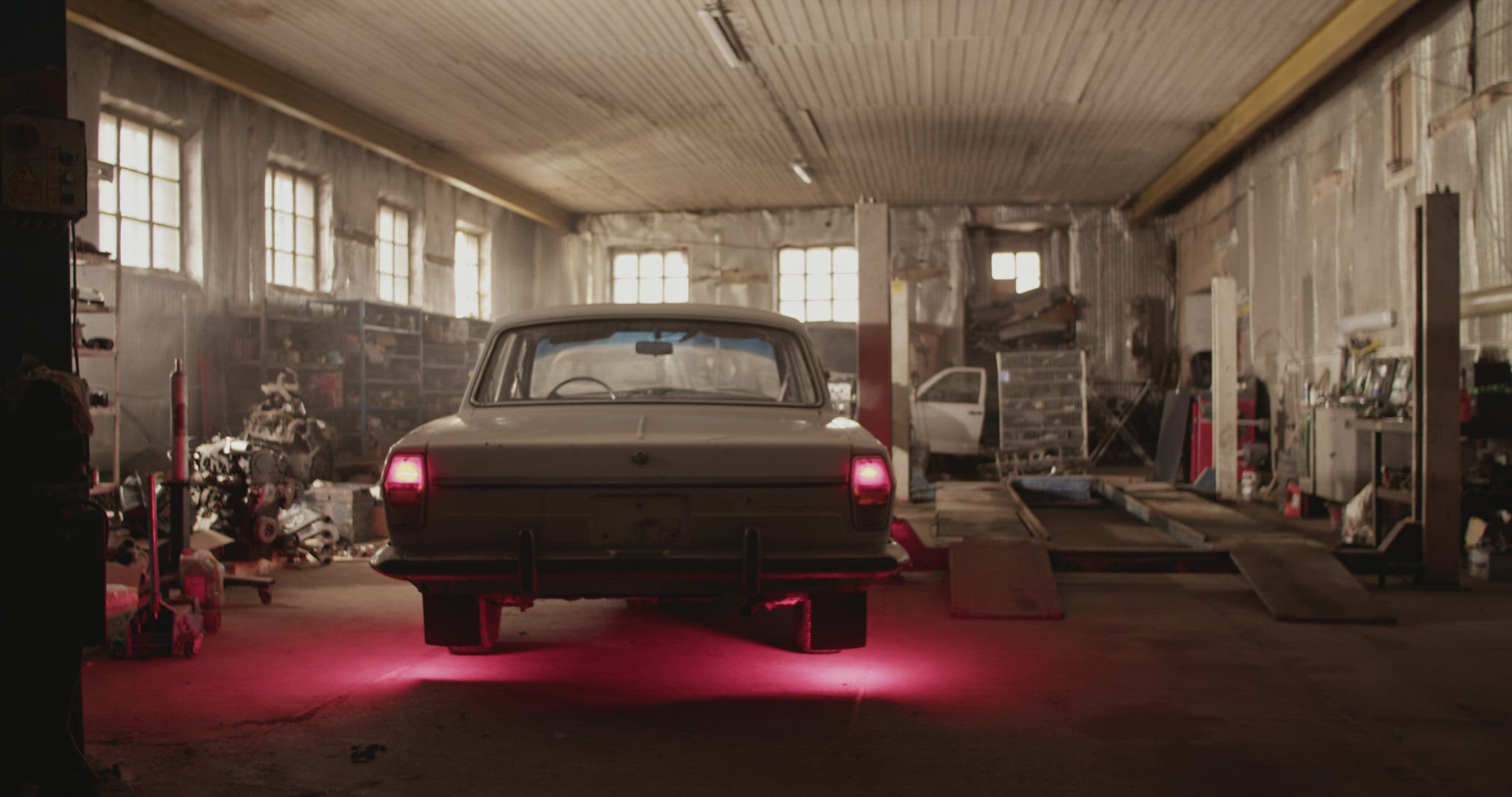 Garage with vintage car in daytime