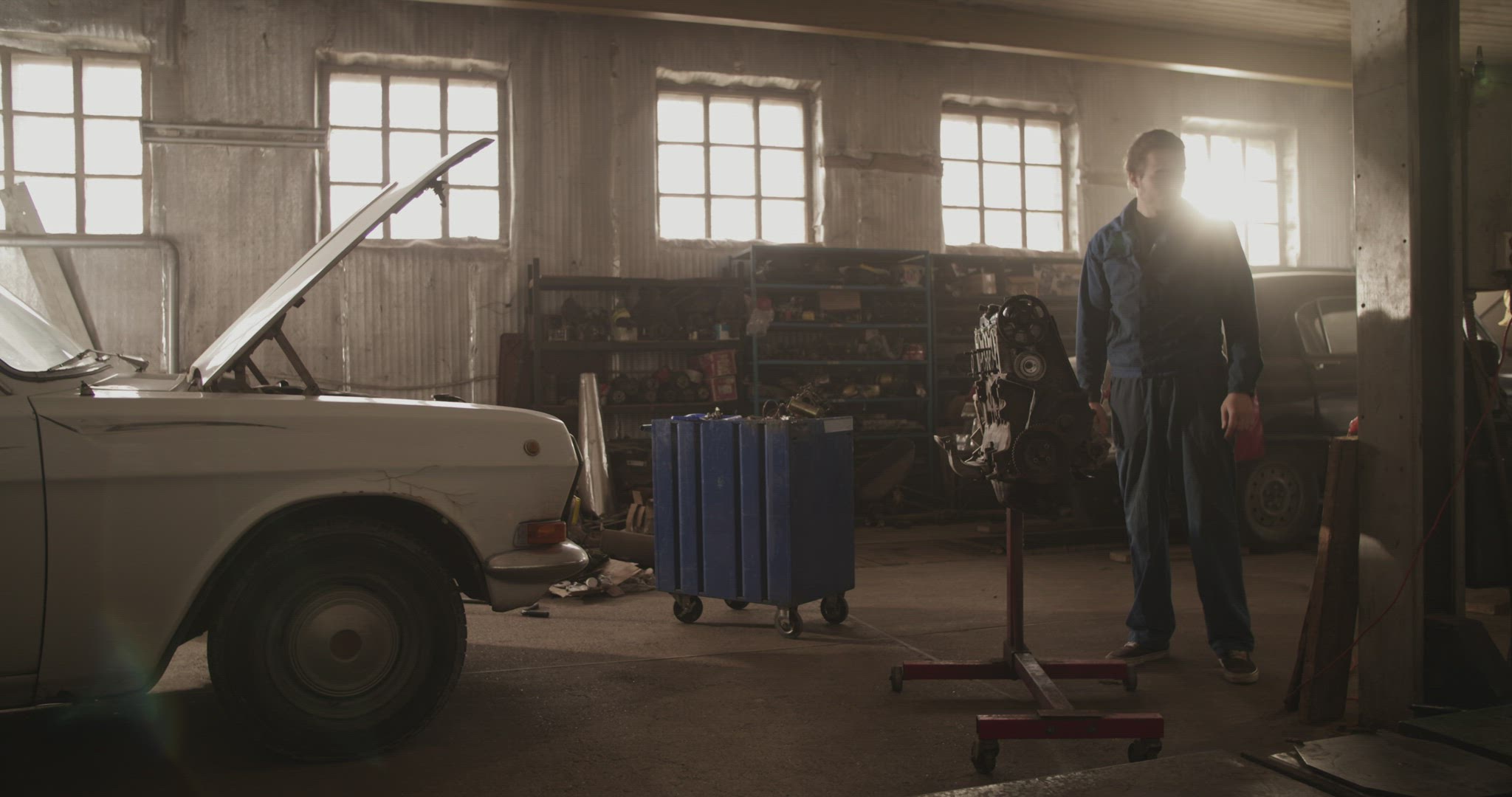 Young man working in garage