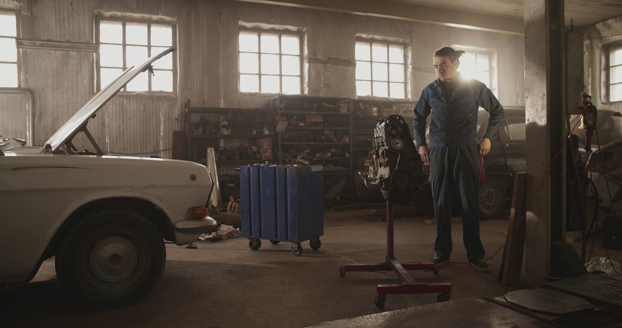 Young man working in garage