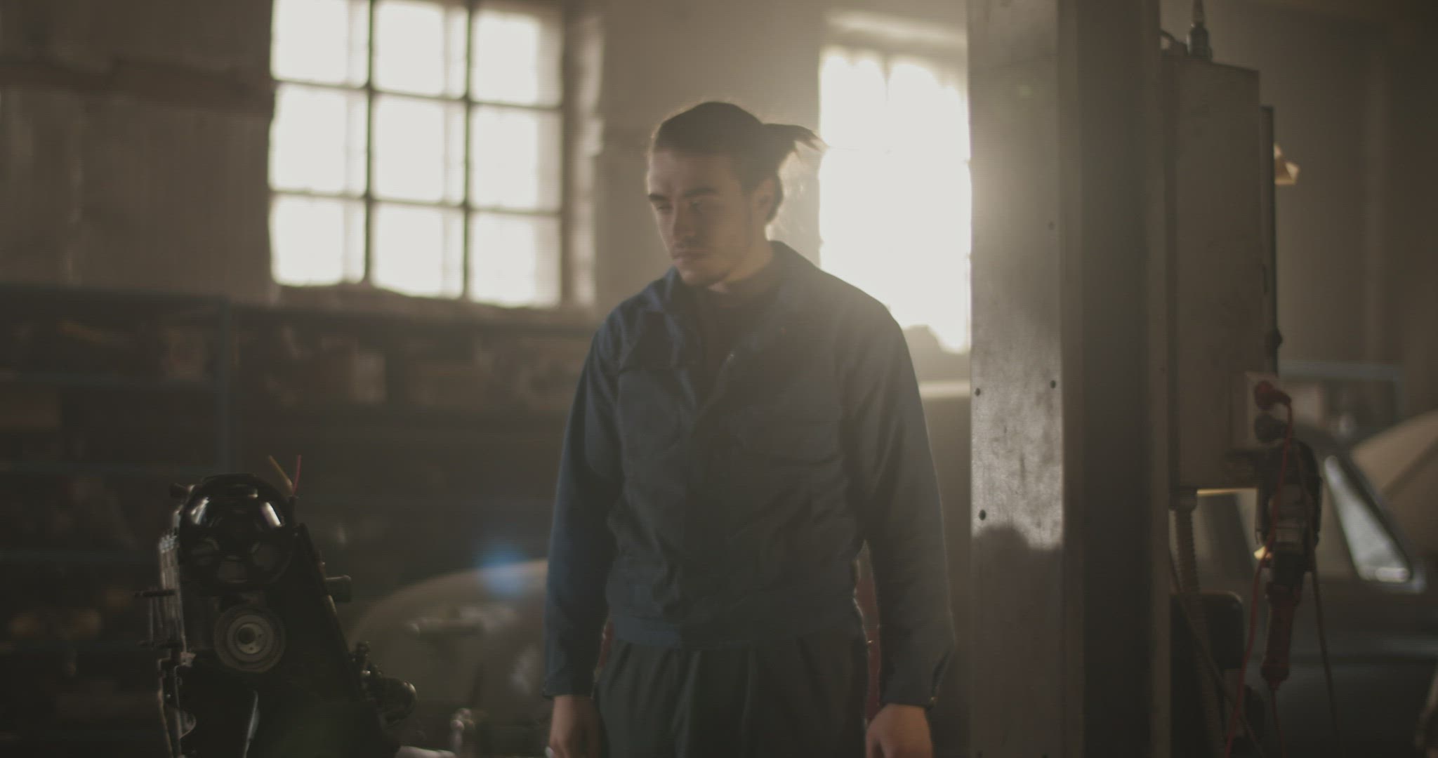 Young man working in garage