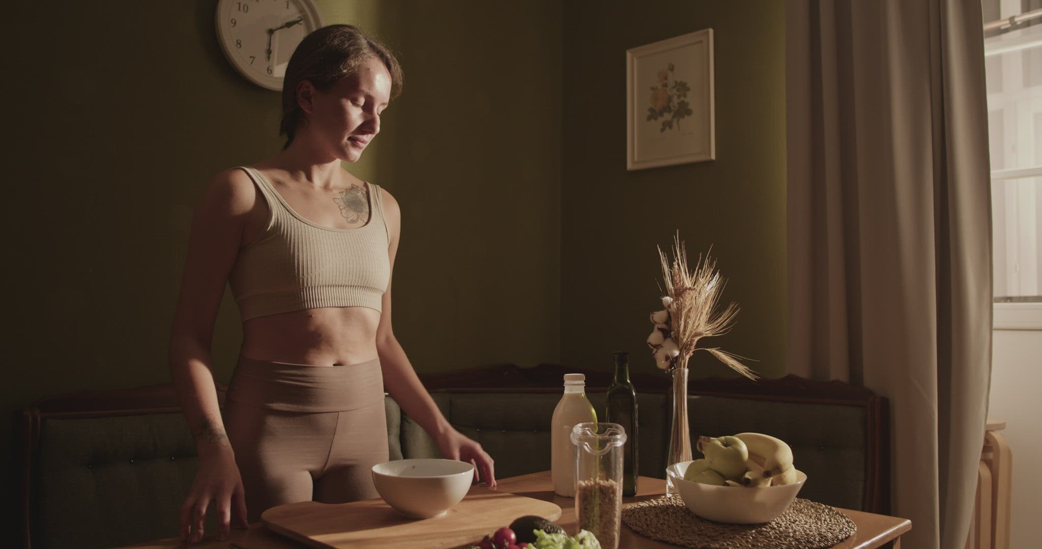 Female preparing healthy breakfast in morning at home