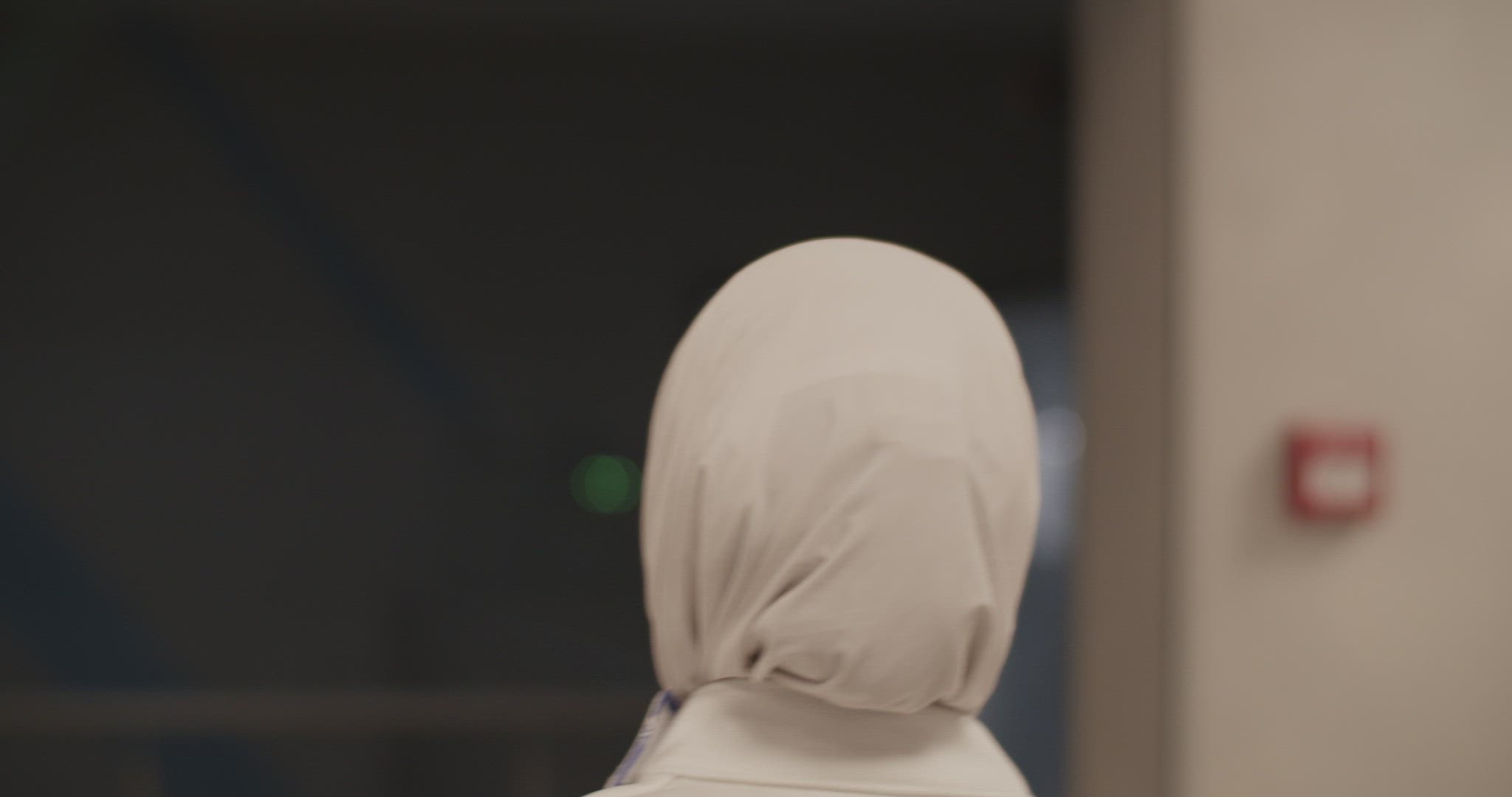 Muslim fencer walking to gym