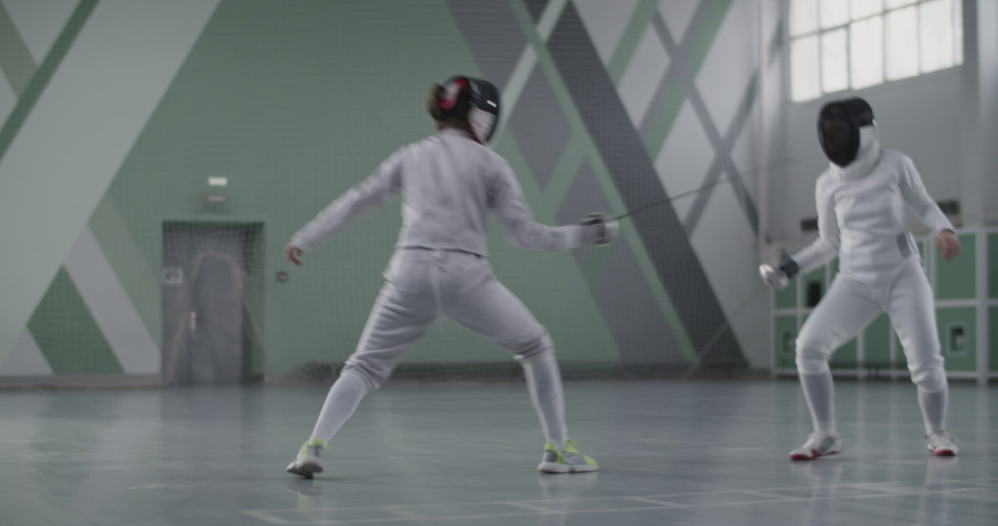 Anonymous fencer training with opponent