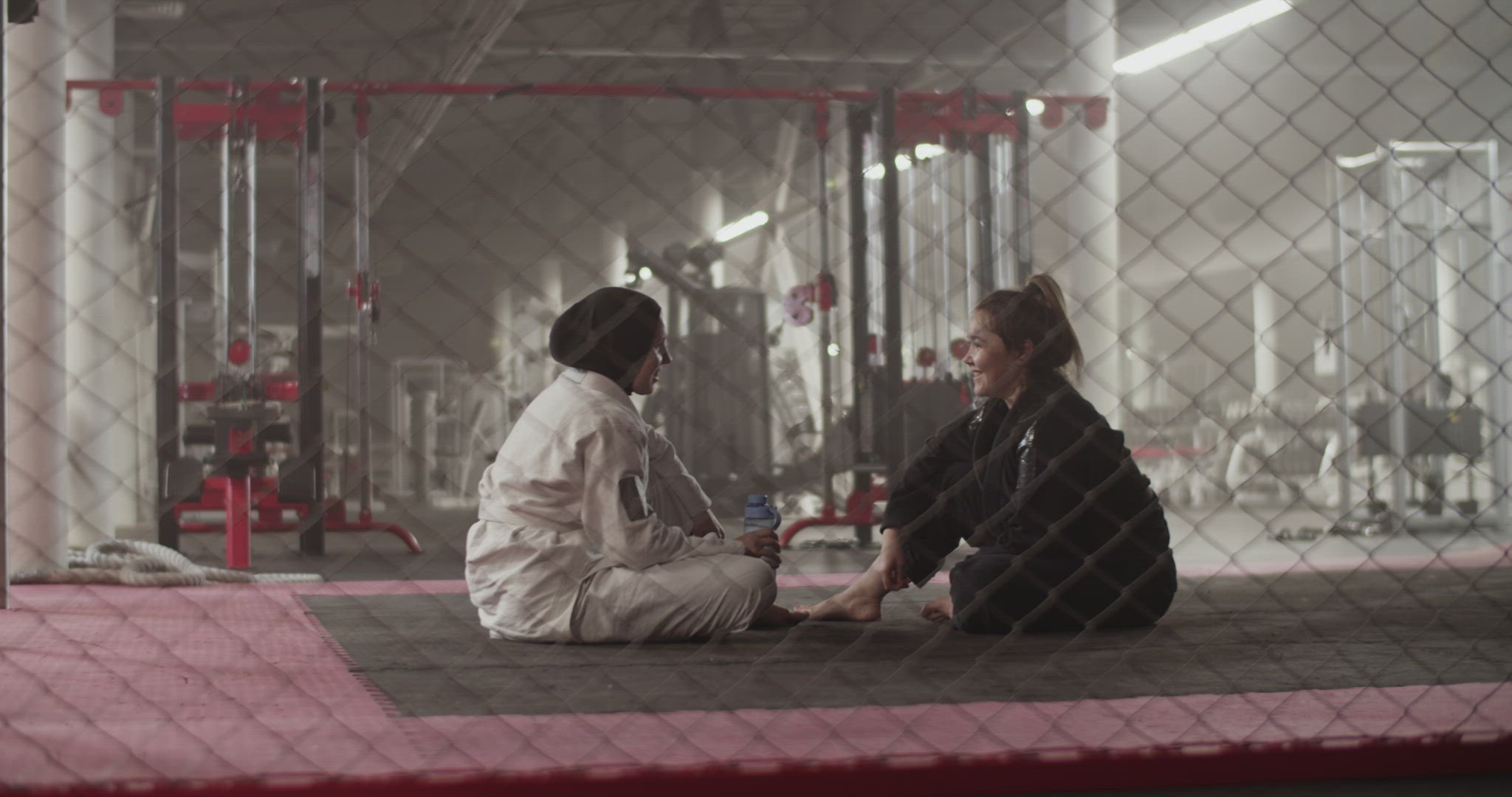 Female fighters talking during break
