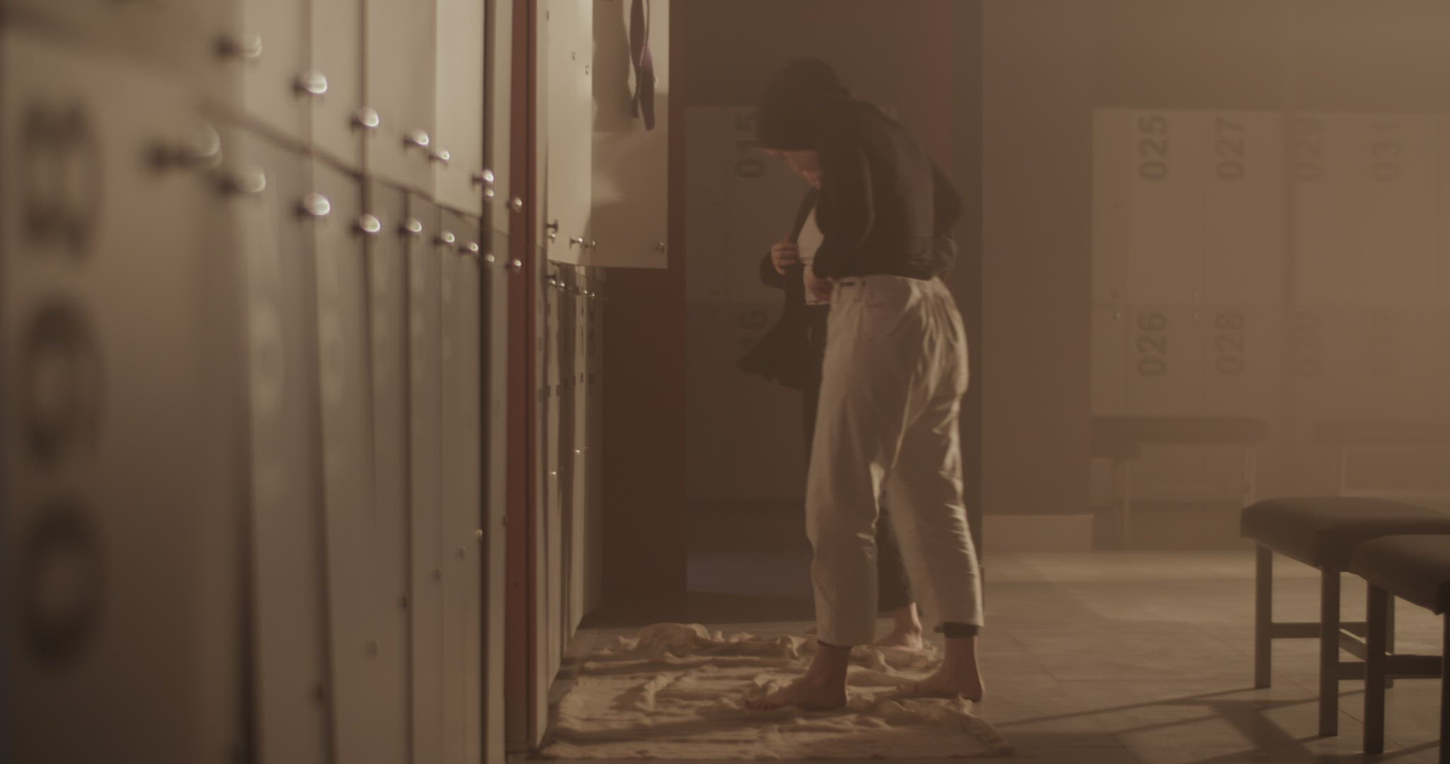 Diverse female wrestlers getting dressed before training