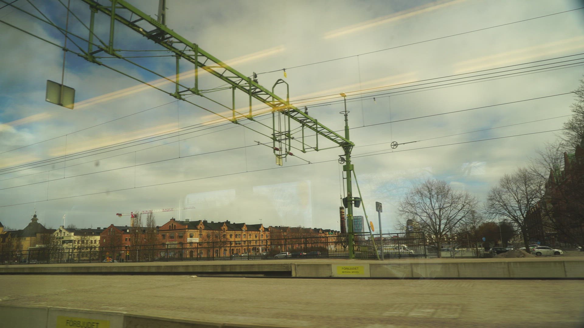 point of view from train window - platform - train leaving Gävle