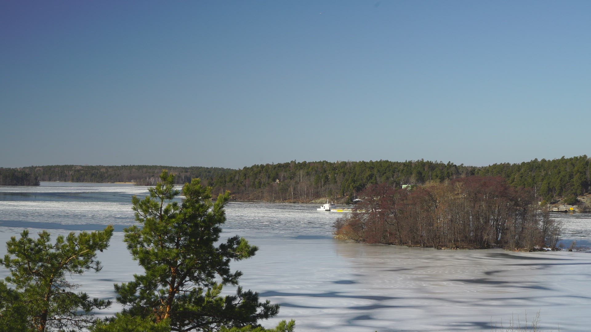 view over lake mälaren - freighter at a distance
