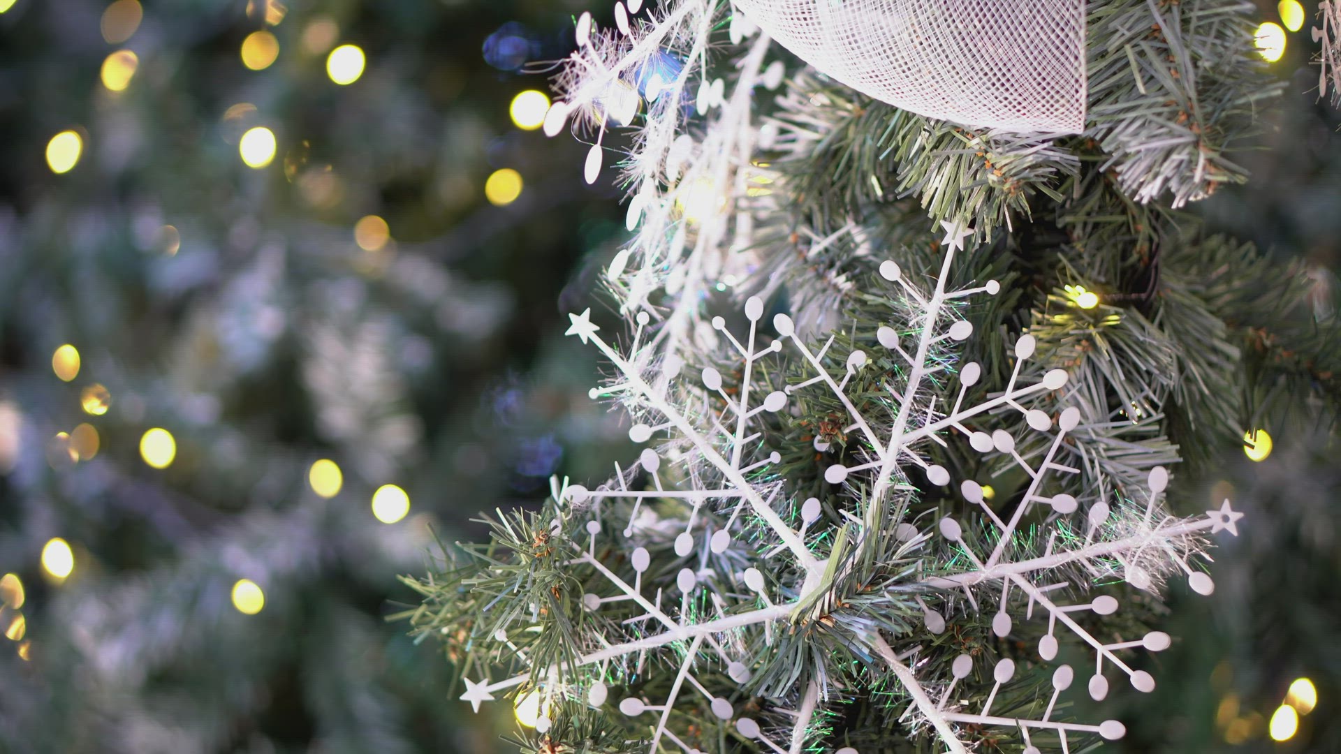 Select focus white snowflake decoration at Christmas tree