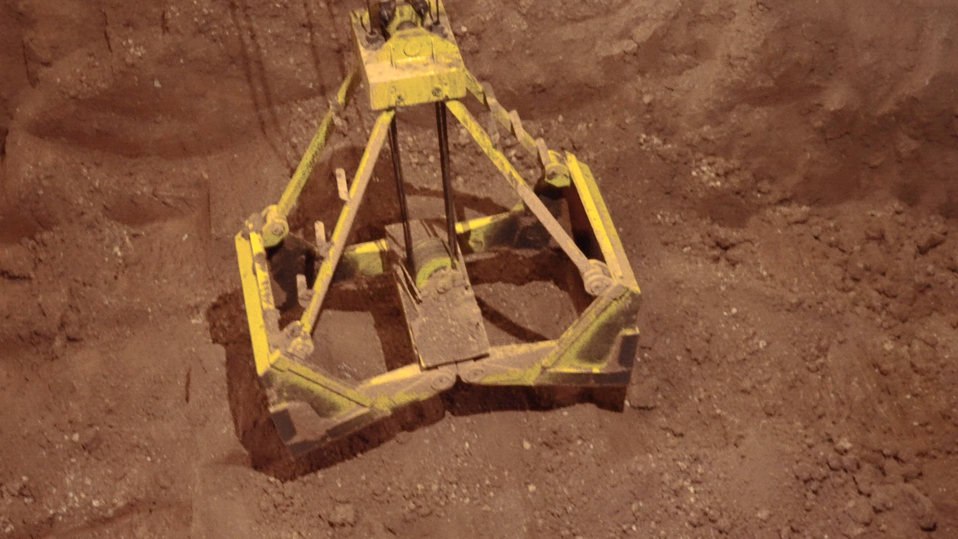 Clamshell bucket digging for clay