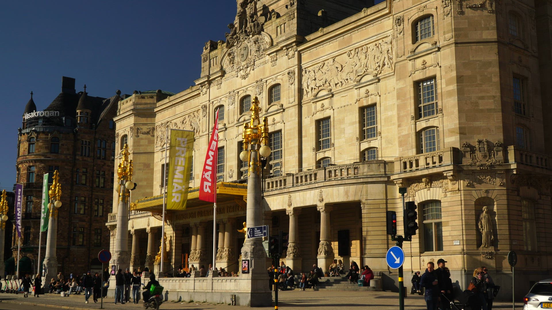 exterior Royal Dramatic Theatre in Stockholm - people walking in street