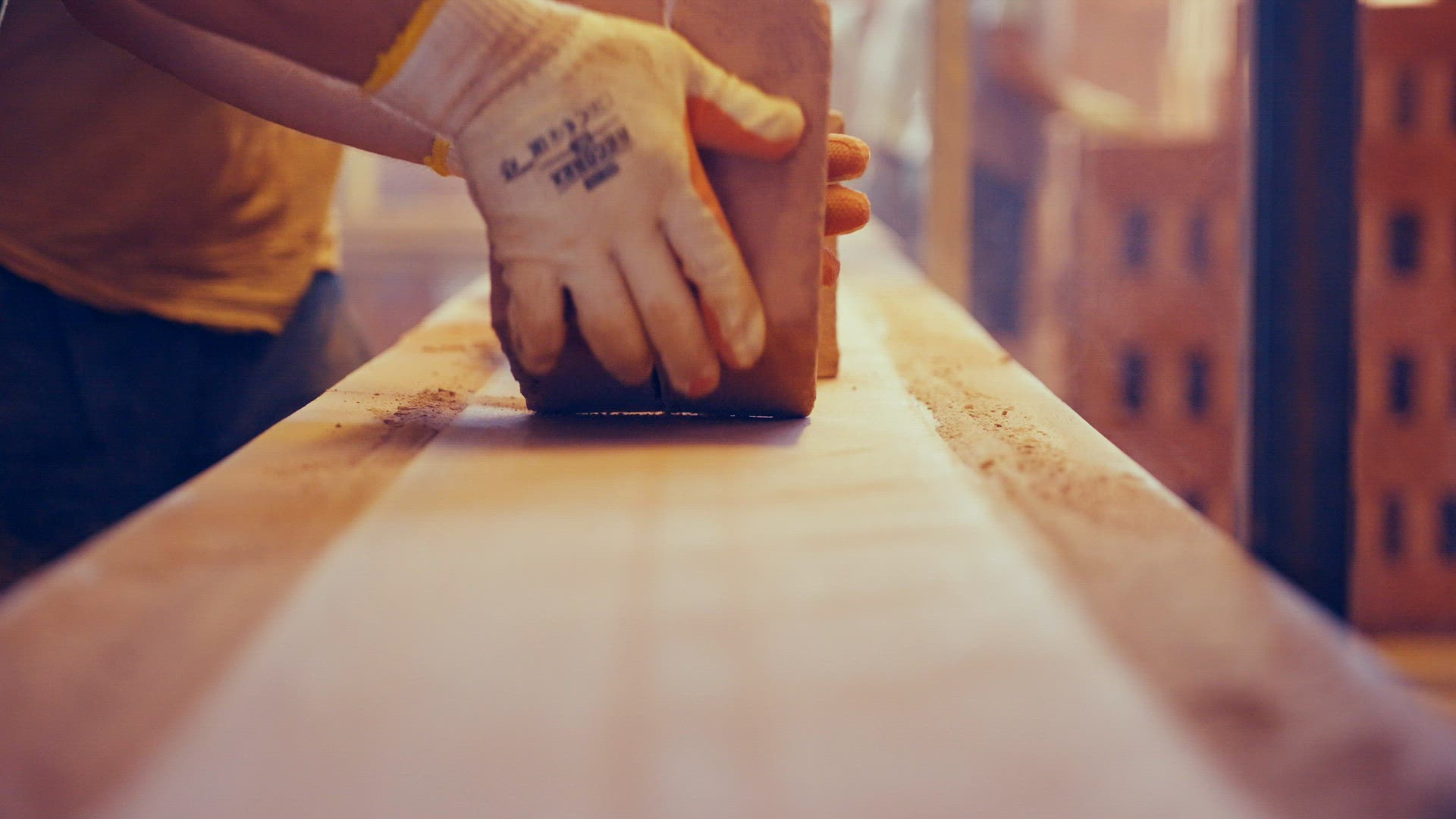 Vintage bricks being put on conveyor belt