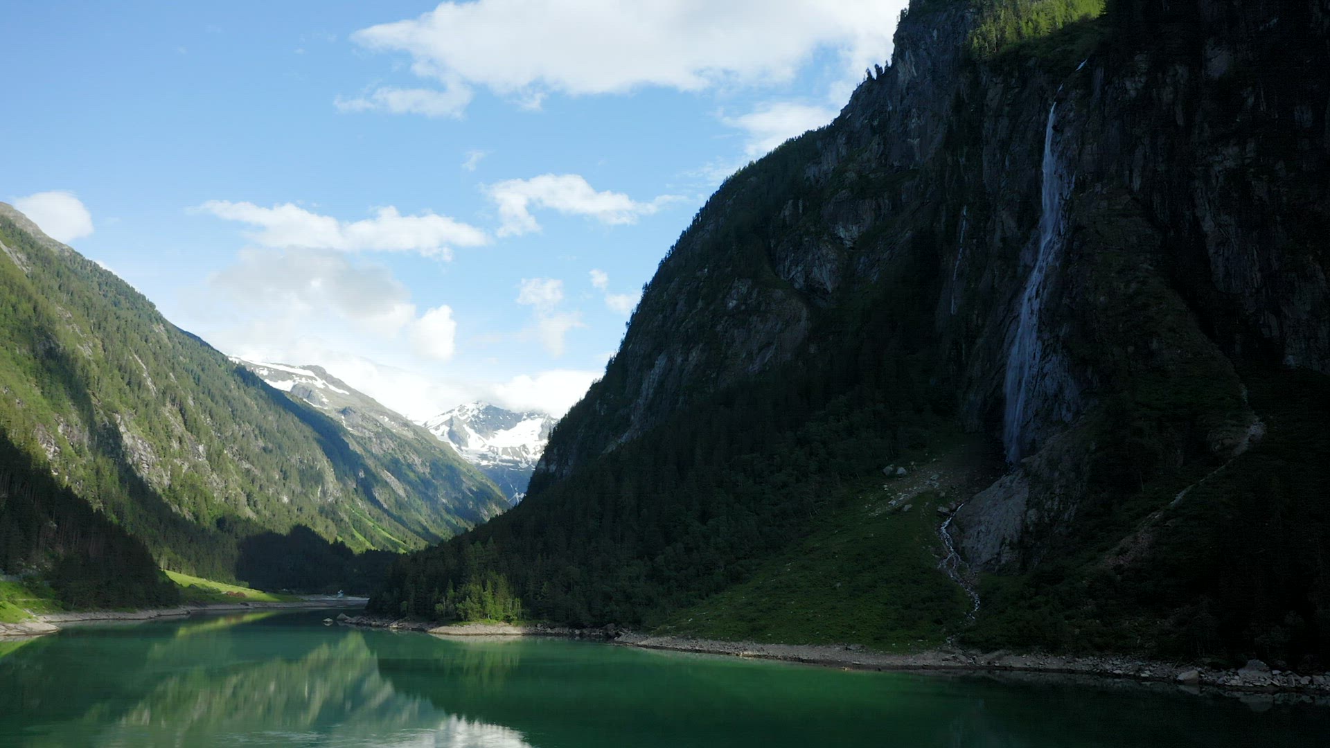 Aerial view of Stillup Lake with impressive waterfall, Austria, Tyrol