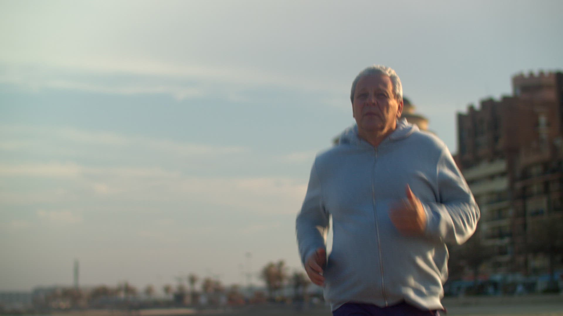 Senior man having everyday jogging training