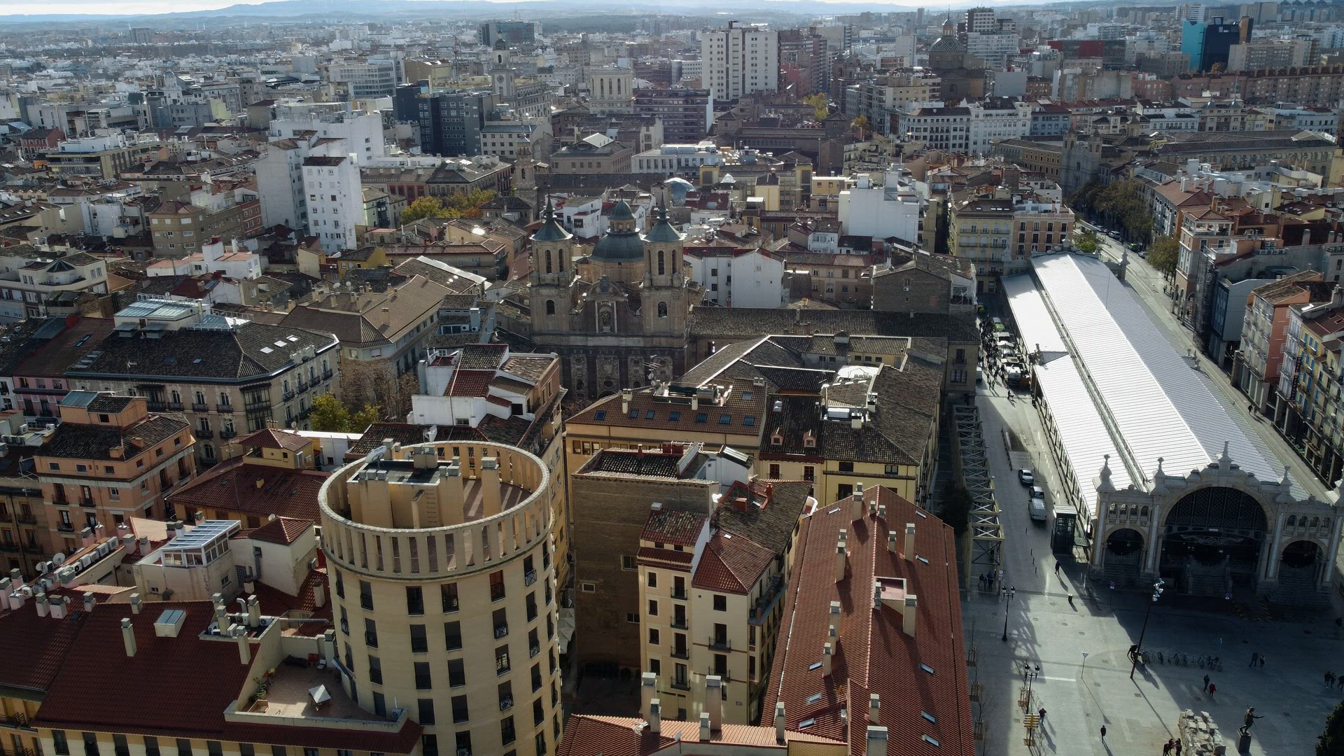 Aerial city view of Zaragoza with Central Market, Spain