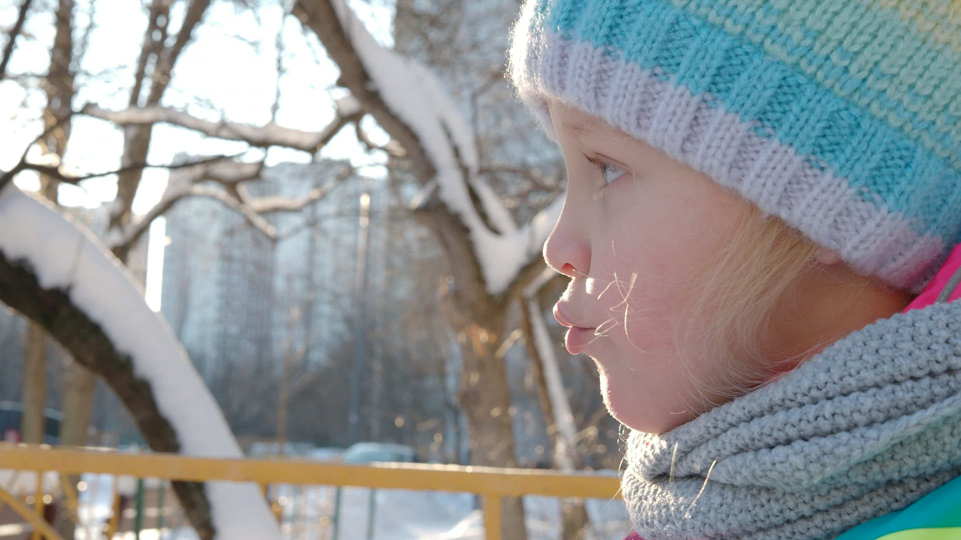 Outdoor winter portrait of little girl