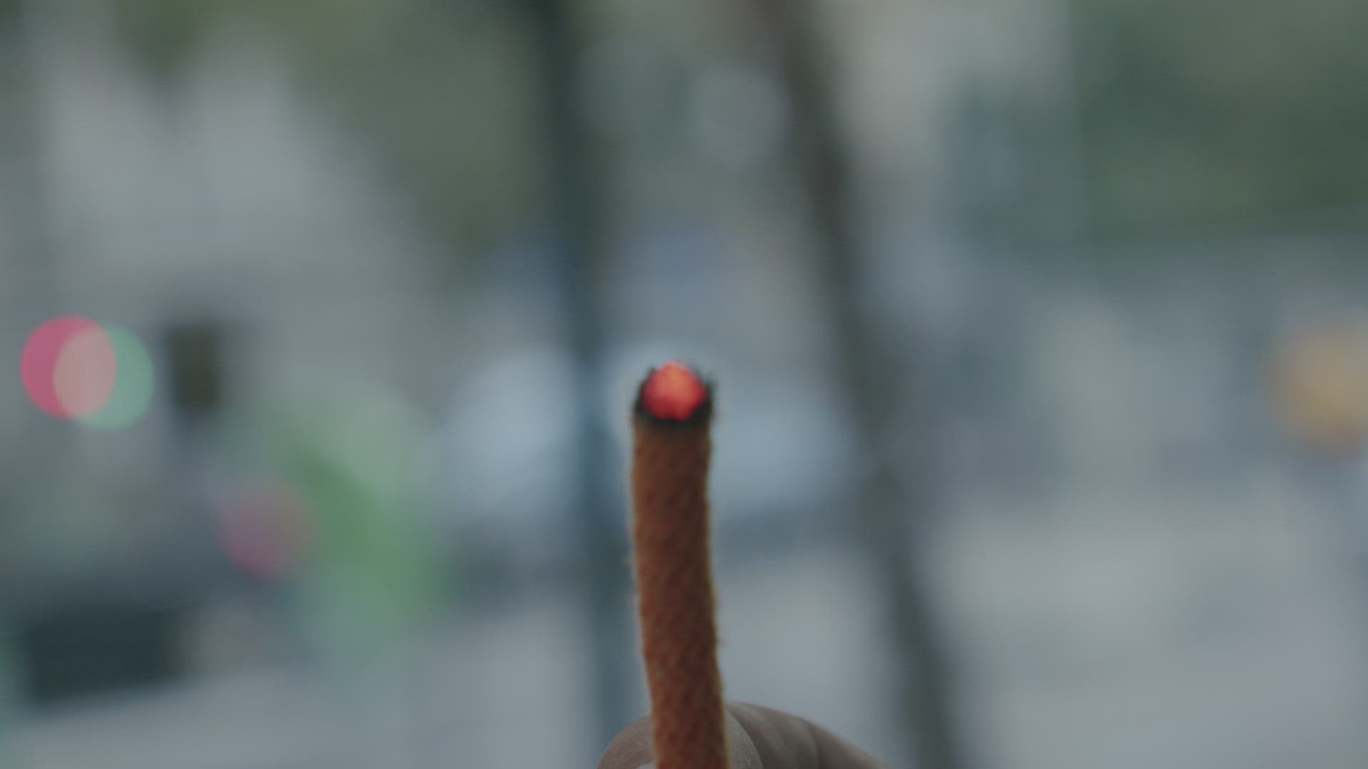 Burning fuse in the hands