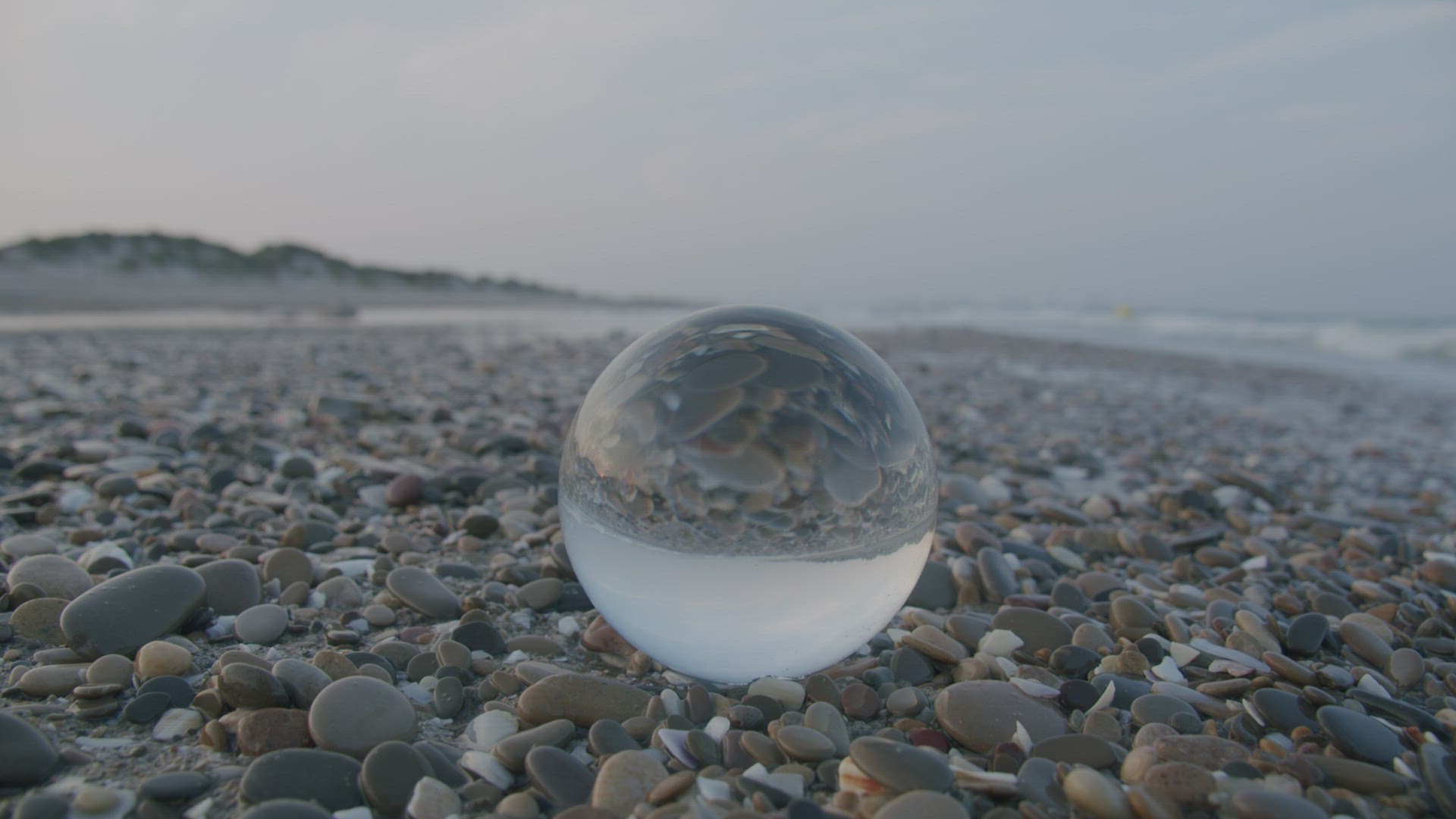 Glass ball on the shore