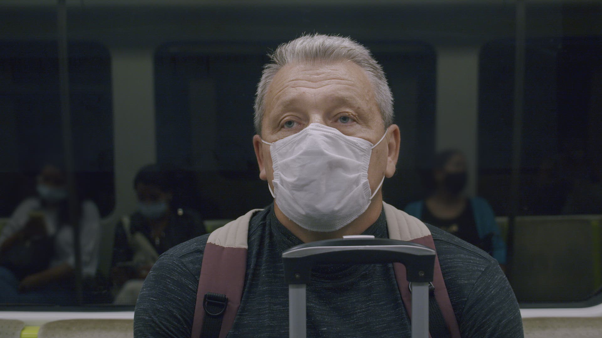 A man in a subway car