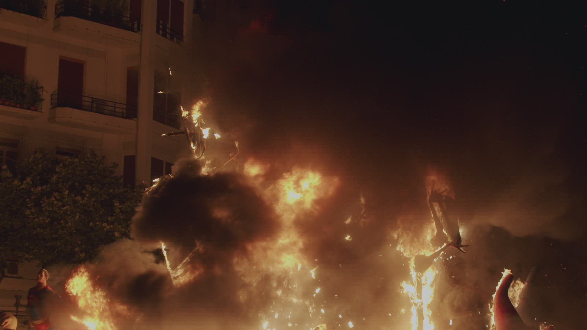 Las Fallas bonfire under control of firefighters