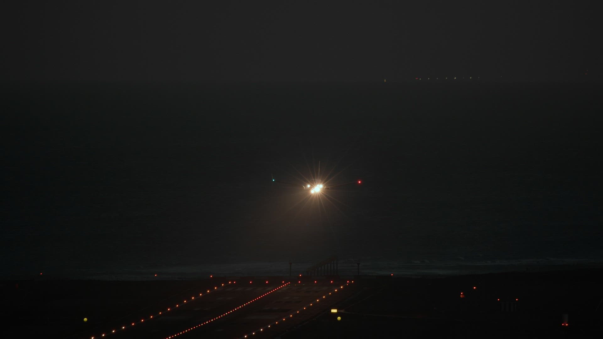 The plane lands at night